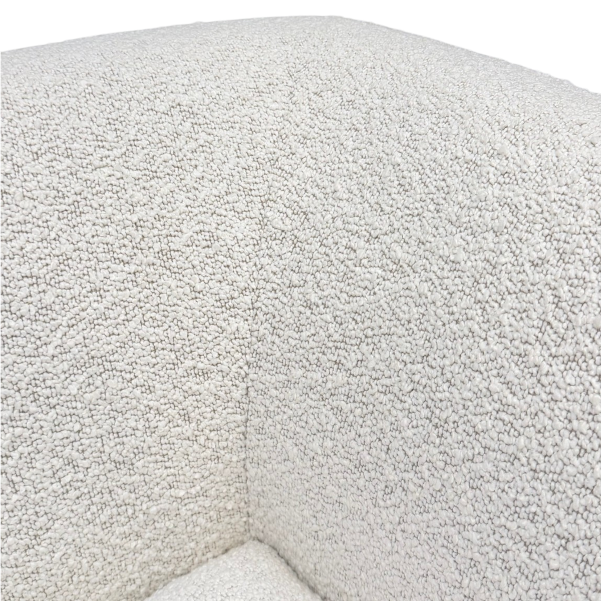 Close-up of the Bento Modular RAF Chair in ivory bouclé, showing the textured looped upholstery and softly rounded corner detail.