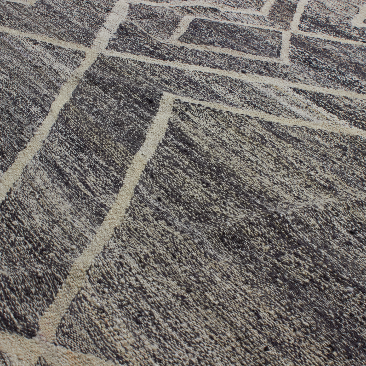 Revered for its lustre and soft hand, the natural qualities of wool from ancient Karakul sheep are honoured through restraint and refinement.