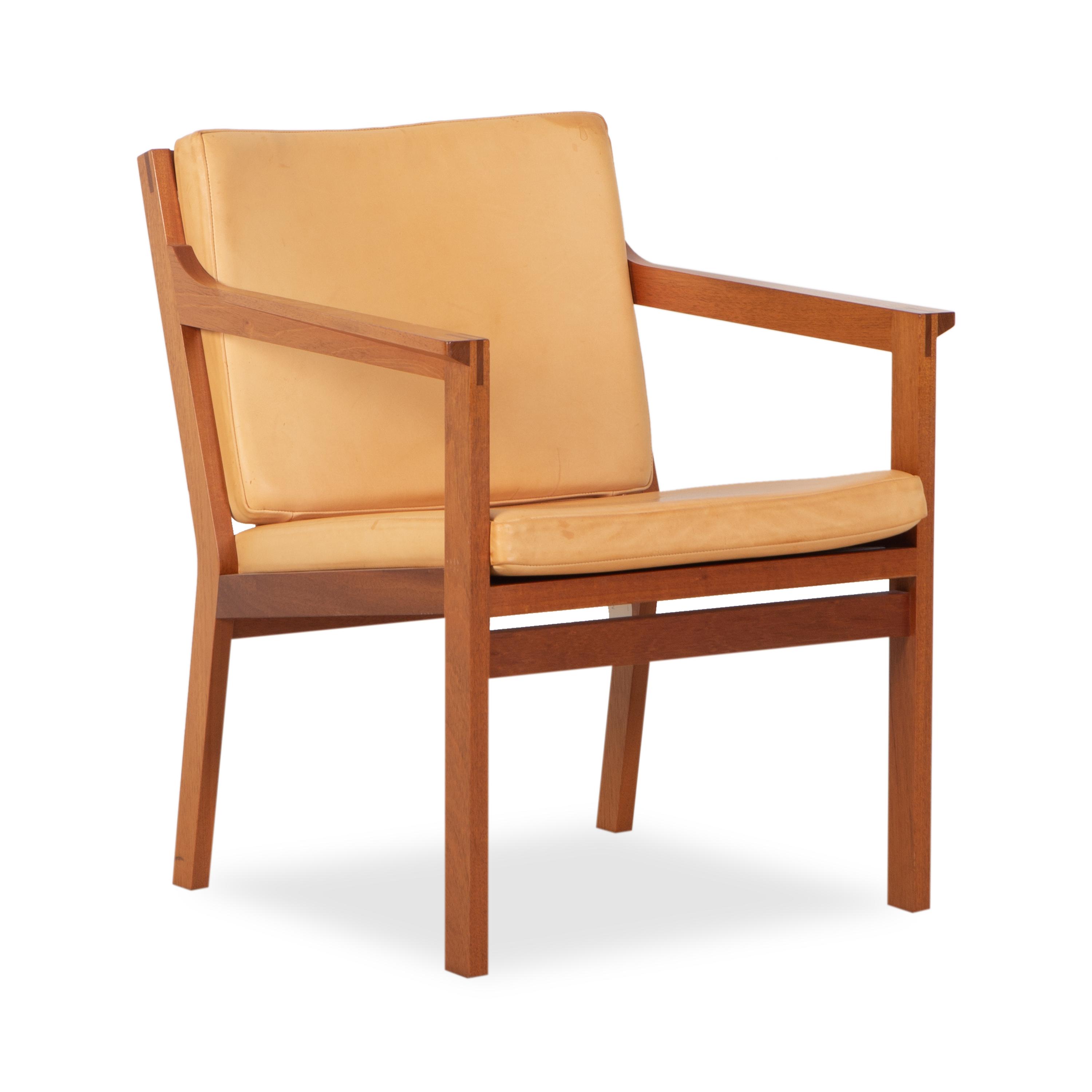 Clean and elegant, this vintage leather armchair was designed by Christian Hvidt for Soborg Mobler, circa 1980s.