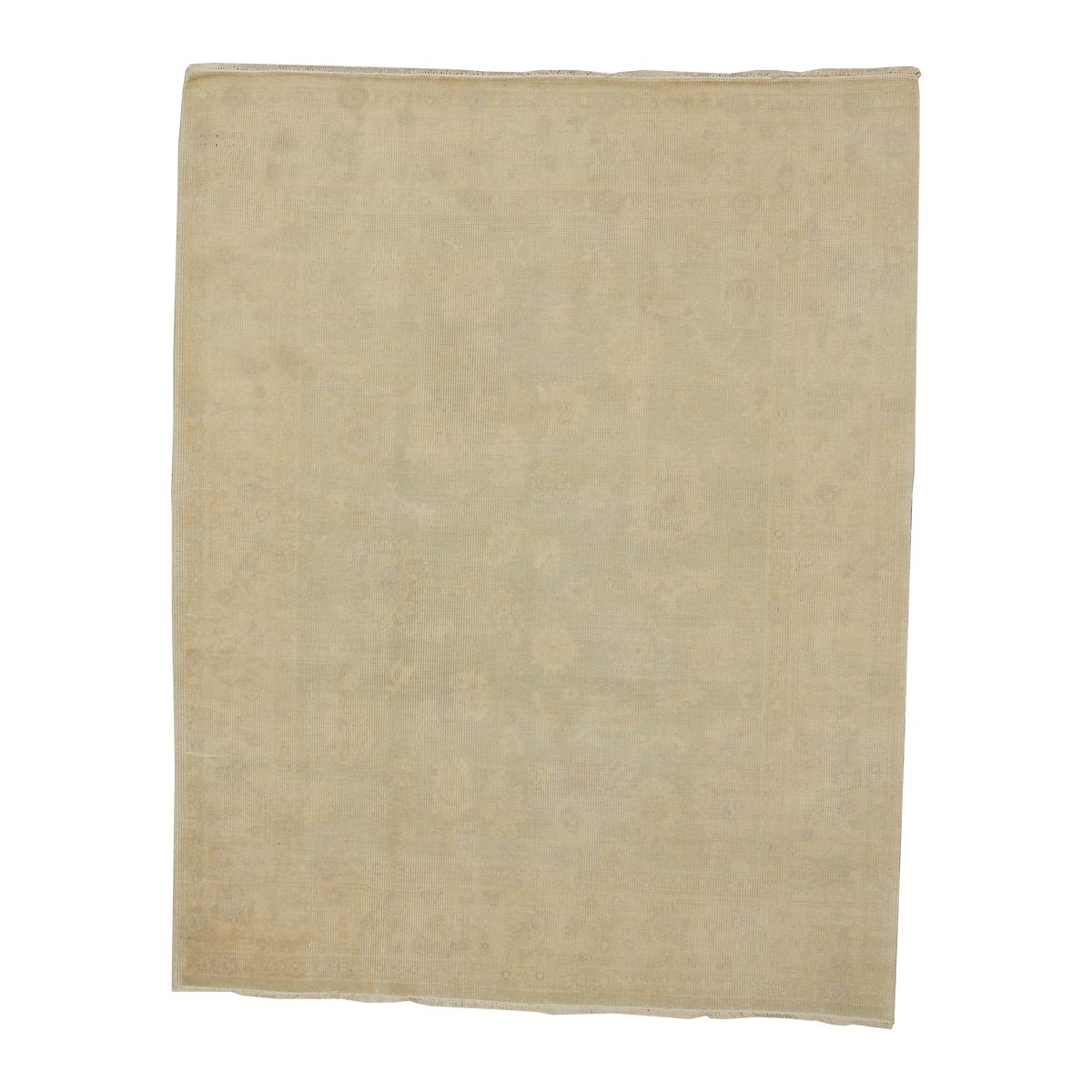 A rectangular area rug with a faded, distressed traditional pattern in muted beige and light gray tones, shown flat against a solid white background.