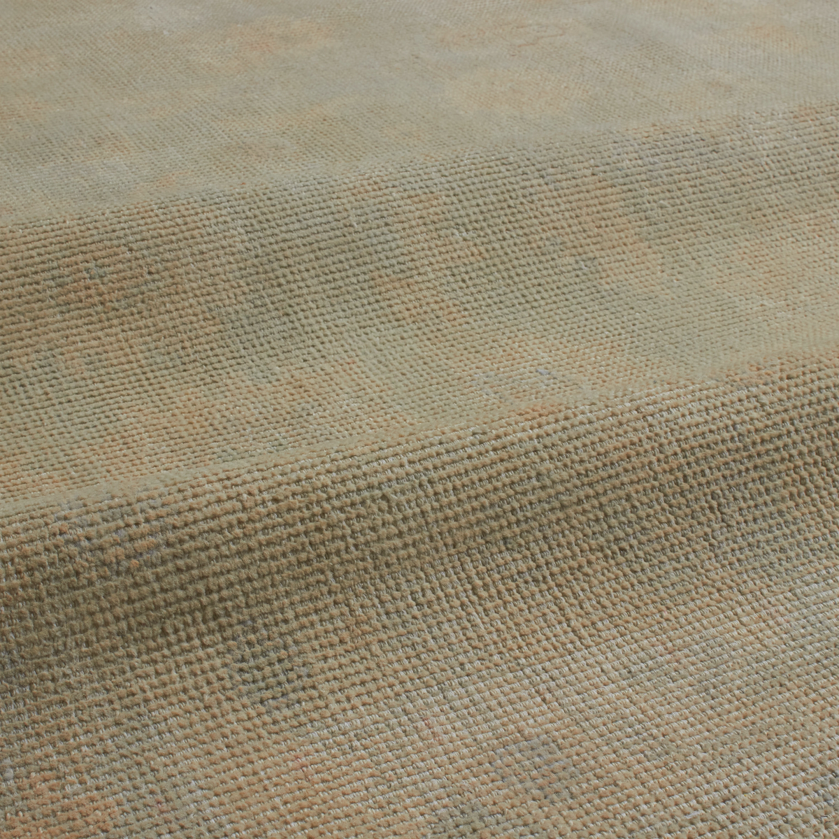 A close-up of woven fabric with a textured basketweave pattern in muted beige, tan, and soft gray tones.
