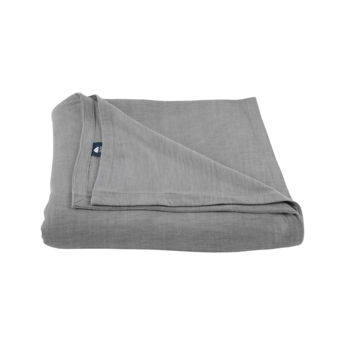 Merino Flat Sheet King in Granite grey Merino Jersey, folded to show the soft drape, double-layered top edge and stitched finish.