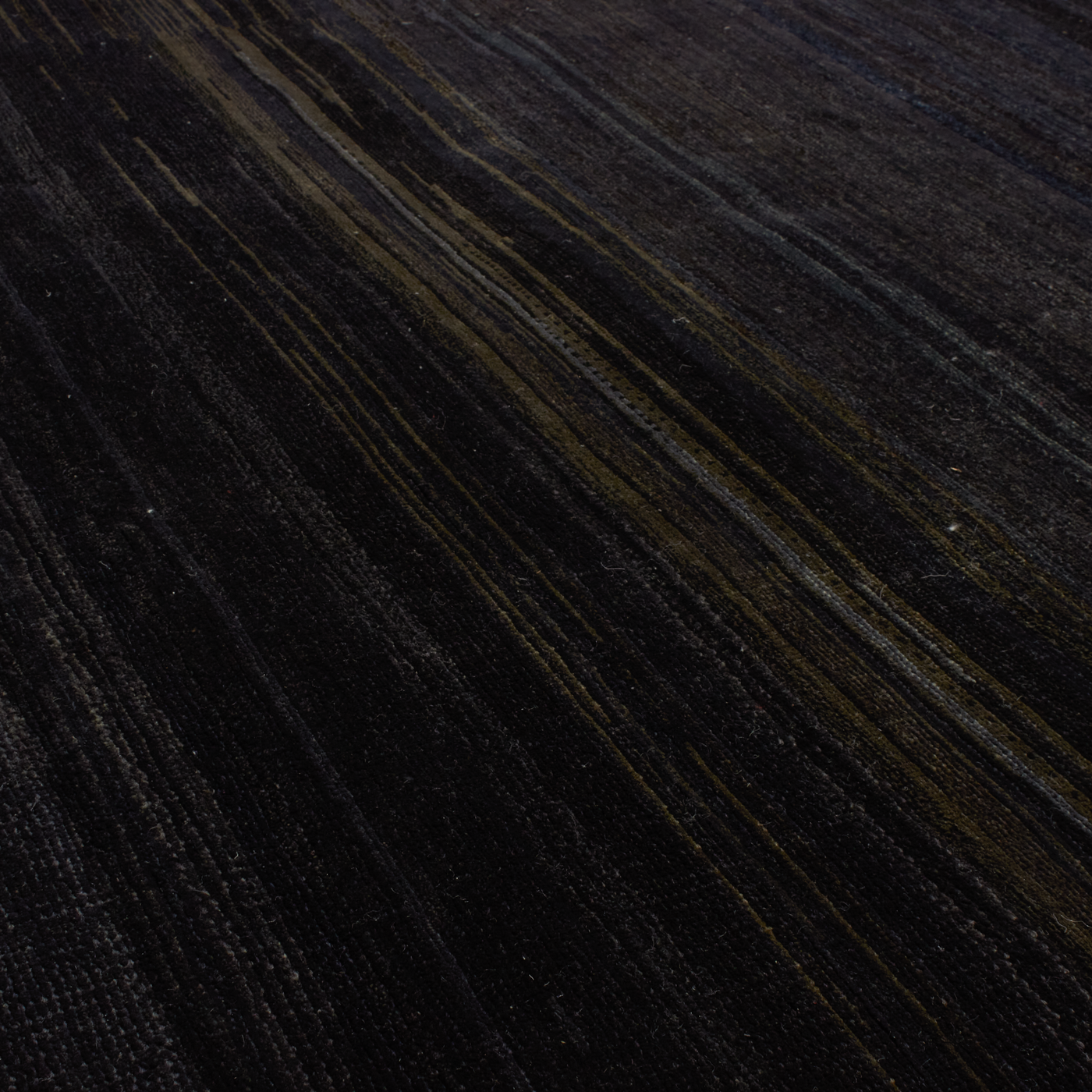Through intricate weaves, knotting techniques and the use of colour, Elte's Solid and Textured rugs add warmth and depth to any space.