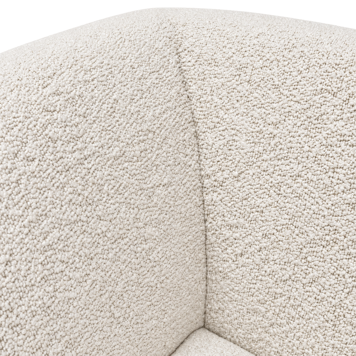 Bento Modular Sectional close-up showing the plush, looped ivory bouclé wrapping a rounded edge, with a soft vertical seam and the seat surface at the lower right.