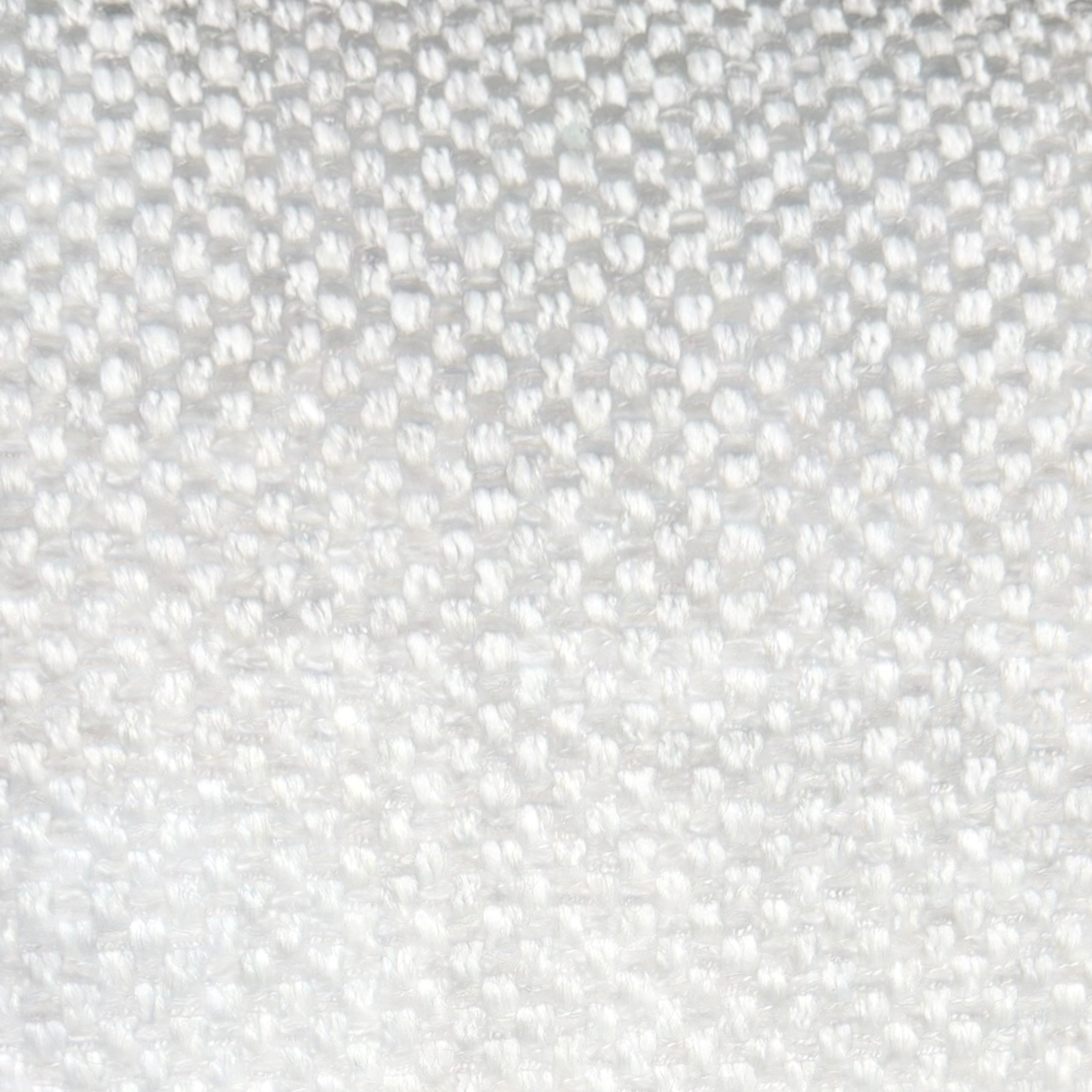 Close-up of Vetro Bullnose Sectional light grey upholstery showing the tightly woven fabric texture.