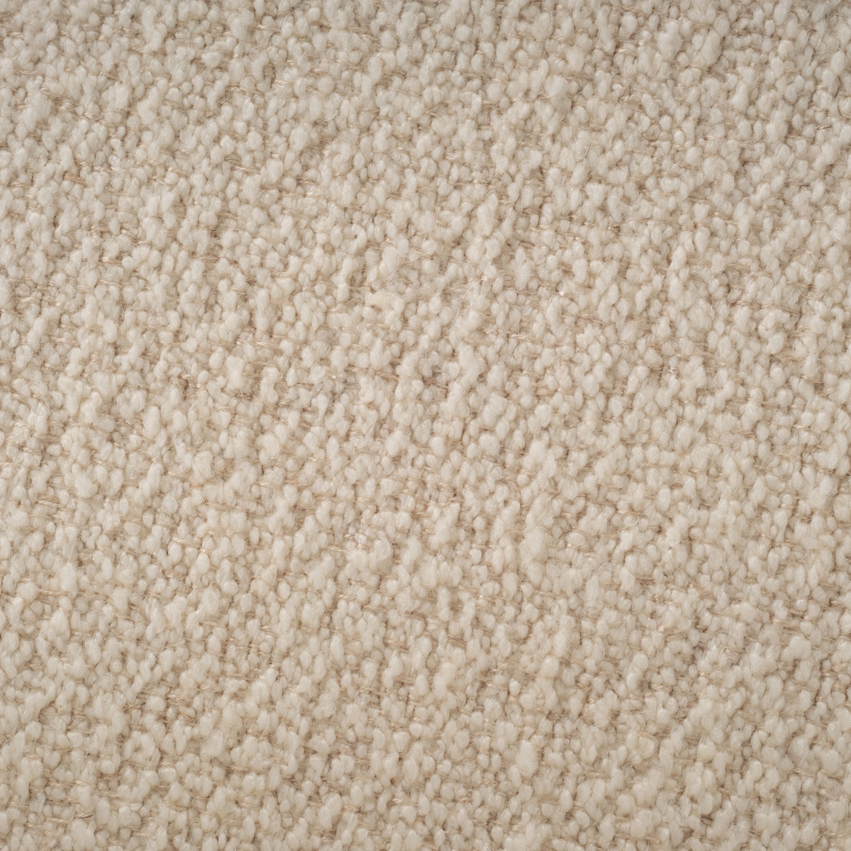 Close-up of the Rhine Modular Sectional Sofa upholstery in cream bouclé, showing the chunky ivory loops woven over a warm beige base