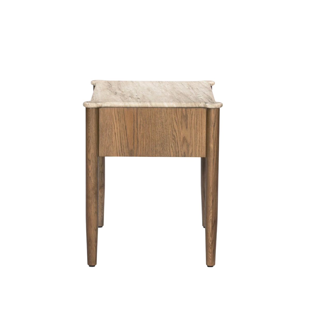 Side view of the Koda Nightstand highlighting the natural oak grain, slim tapered legs and overhanging travertine stone top.