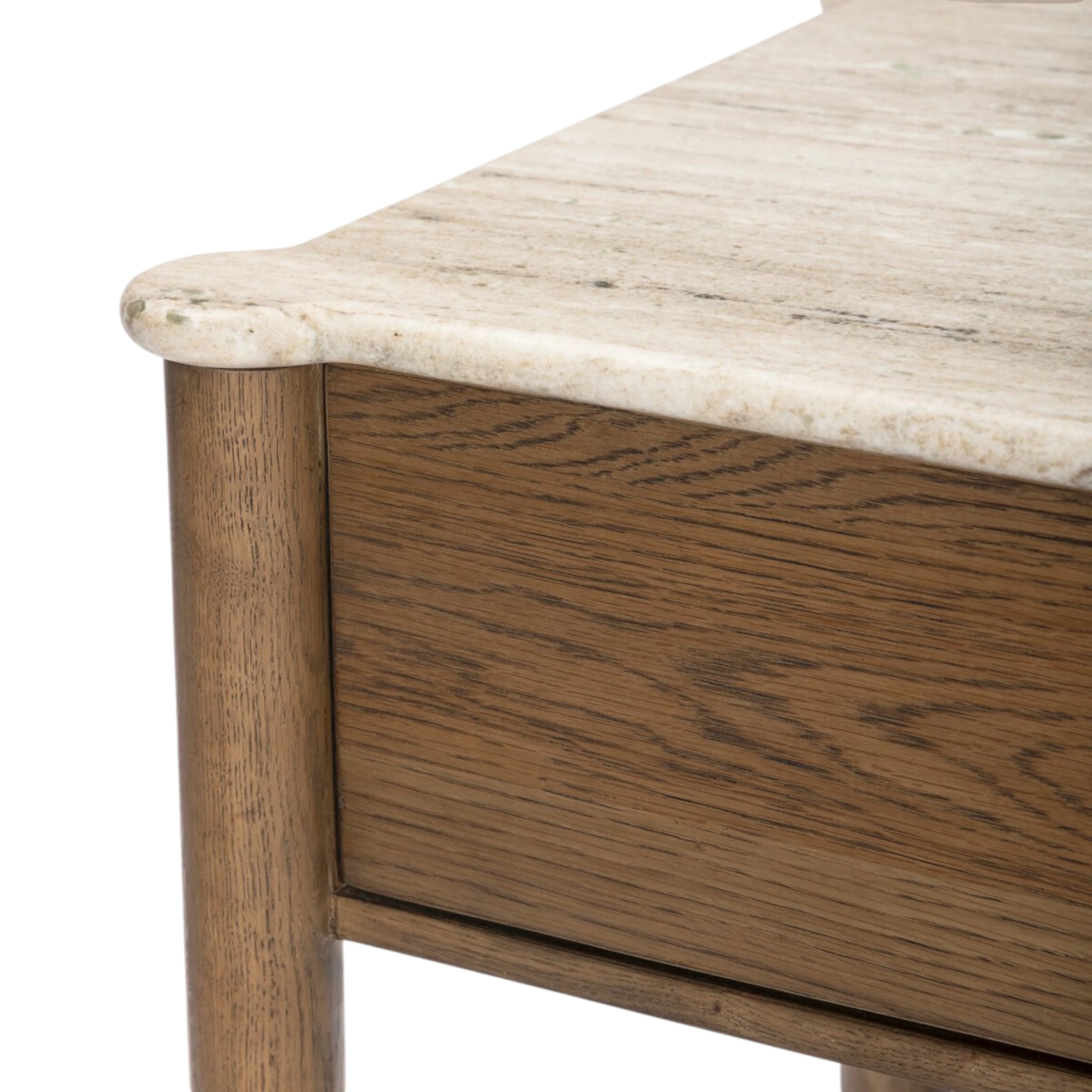 Close-up of the Koda Nightstand showing the light oak drawer front, rounded wood frame and softly veined travertine top.