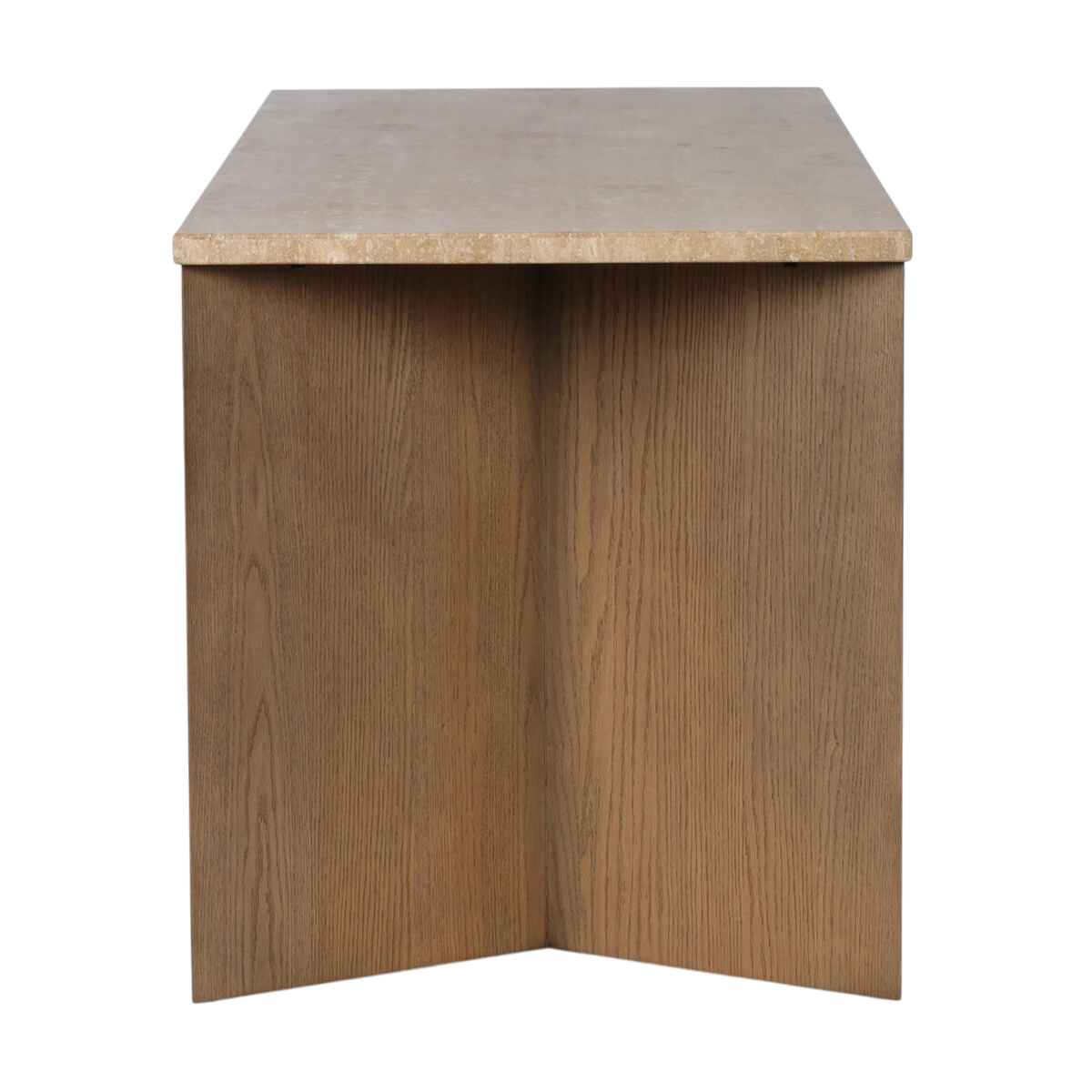 Side view of the Cobble Desk showing the substantial oak panel leg, natural wood grain and slim travertine top.