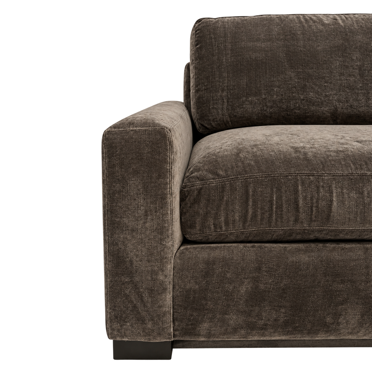 Close-up showing the Arizona Sofa's arm and seat cushion in Charcoal Brown textured velvet, with a soft mottled pile and a tailored edge seam.