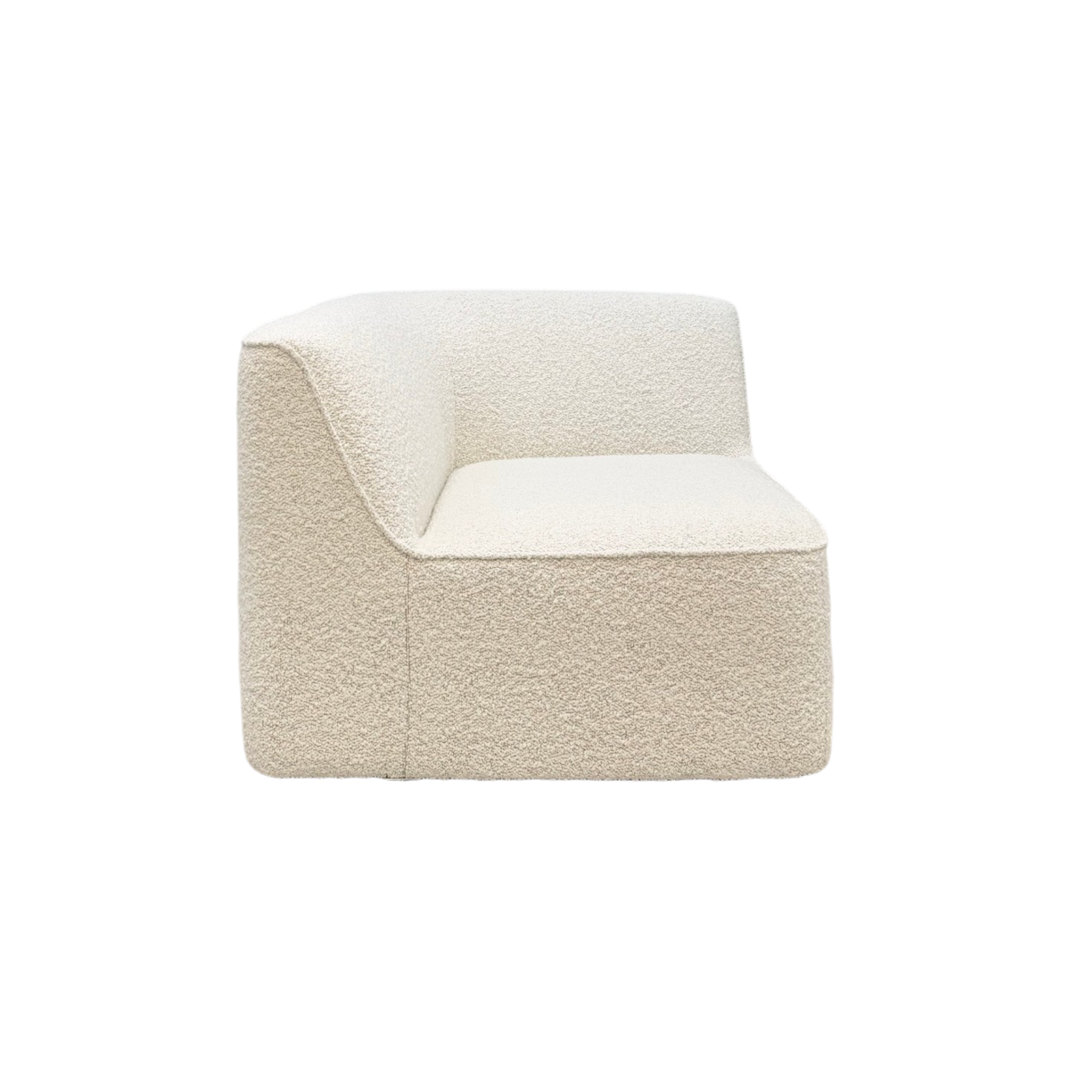 Bento Modular Corner Chair in ivory bouclé, side view showing the low wraparound back, rounded corner silhouette, and softly curved seat.