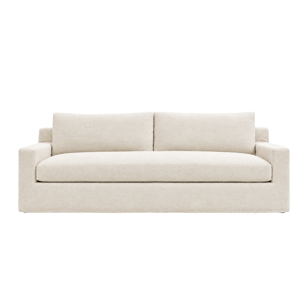 Babylon Sofa shown from the front in natural linen, with structured track arms, a deep bench seat cushion, two back cushions and a fully upholstered waterfall base.