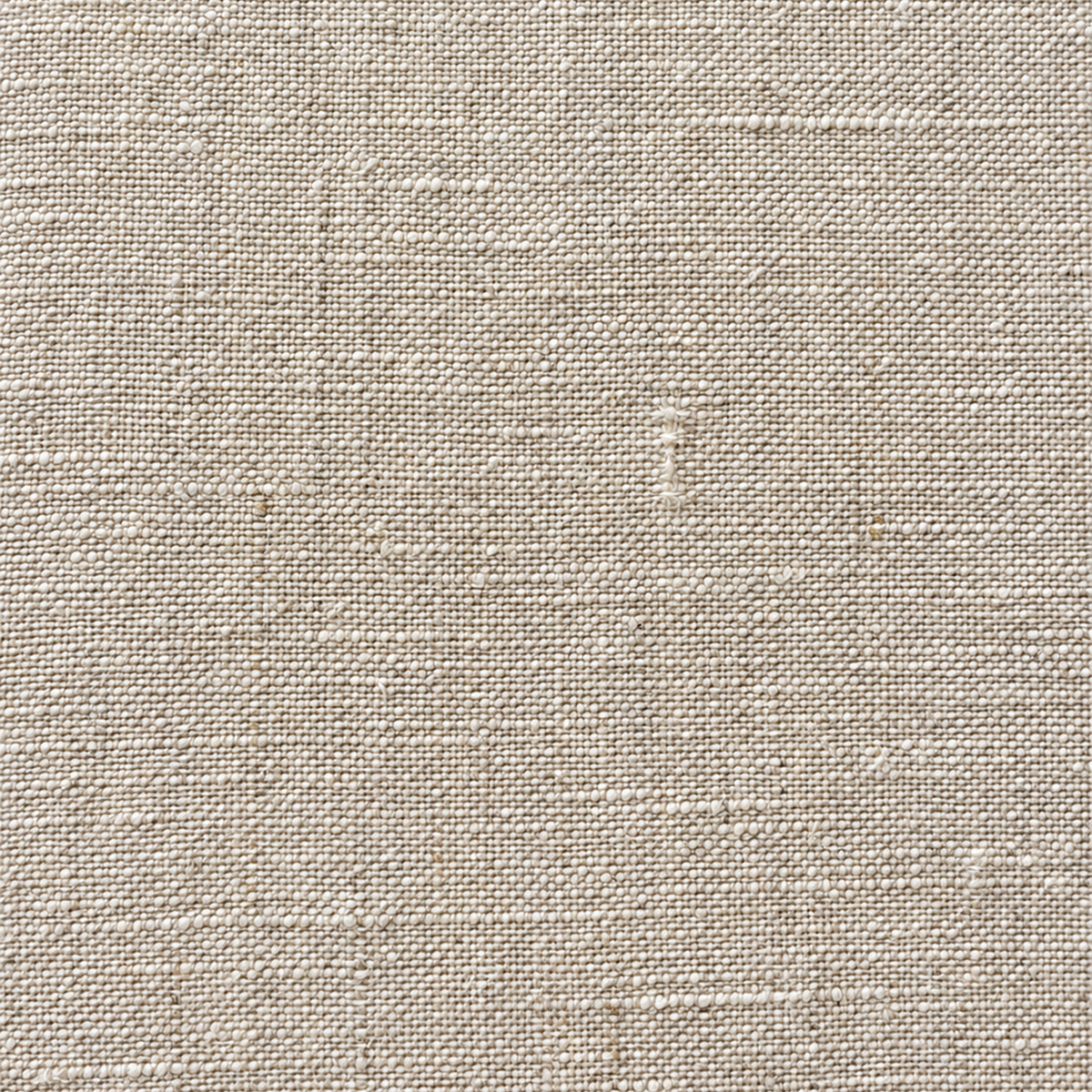 Babylon Sofa fabric, extreme close-up showing the natural linen's flat plain weave, with visible slubs and small fiber irregularities throughout.