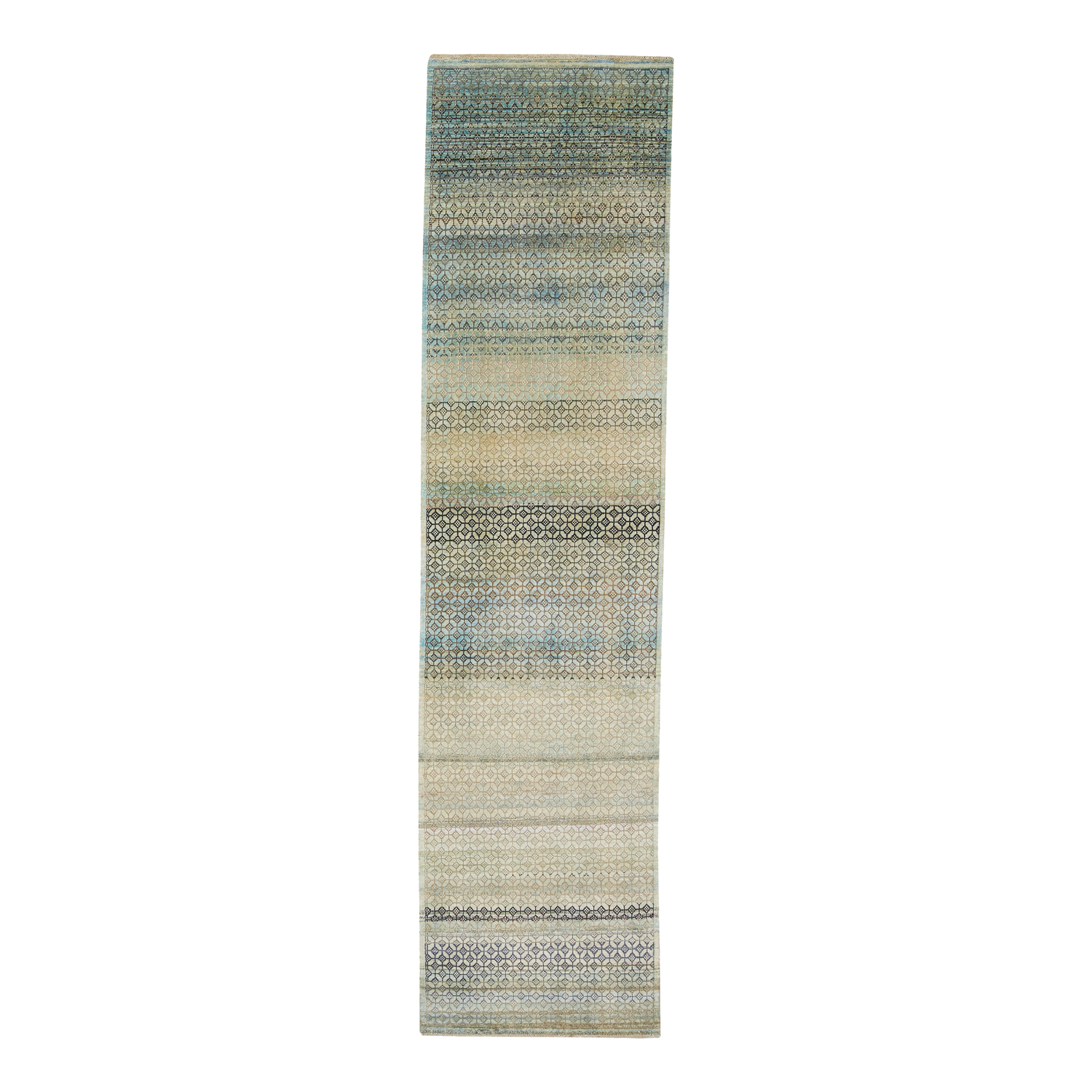 Designed to be passed through generations%2C the New Heirloom Rug Collection is crafted from recycled and upcycled wool%2C cocoon silk and sari silk.