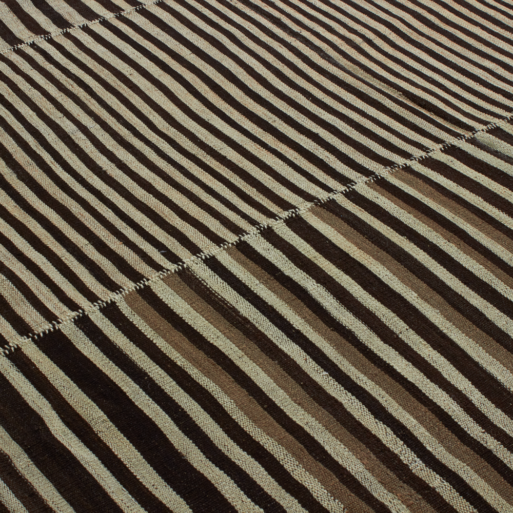 With a focus on minimalist design, our Tribal Kilim Collection features new, vintage and antique rugs that fit well with modern interiors.