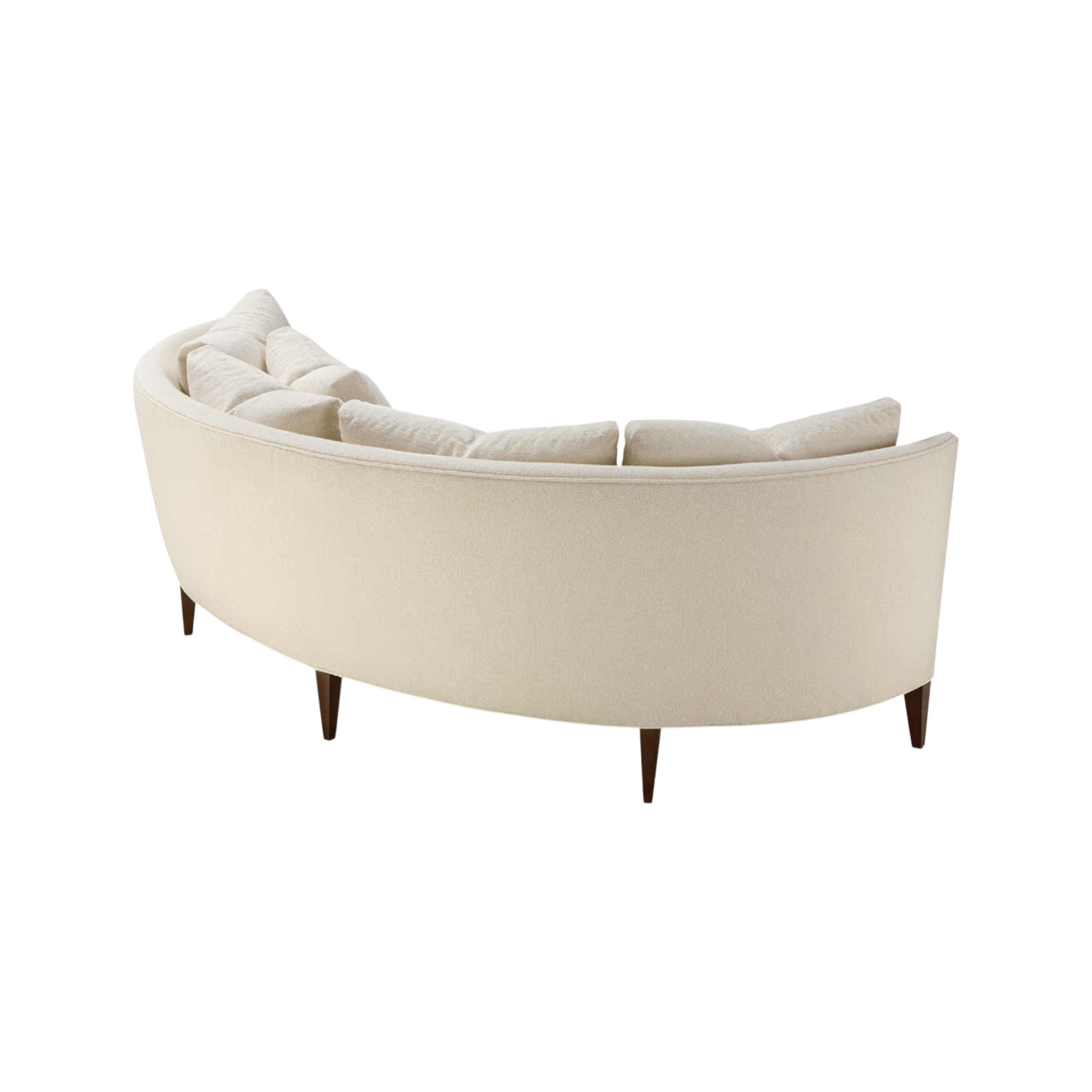 Rear three-quarter view of the Parker Sofa, highlighting its sweeping curved back, cream upholstery and tapered wood legs.