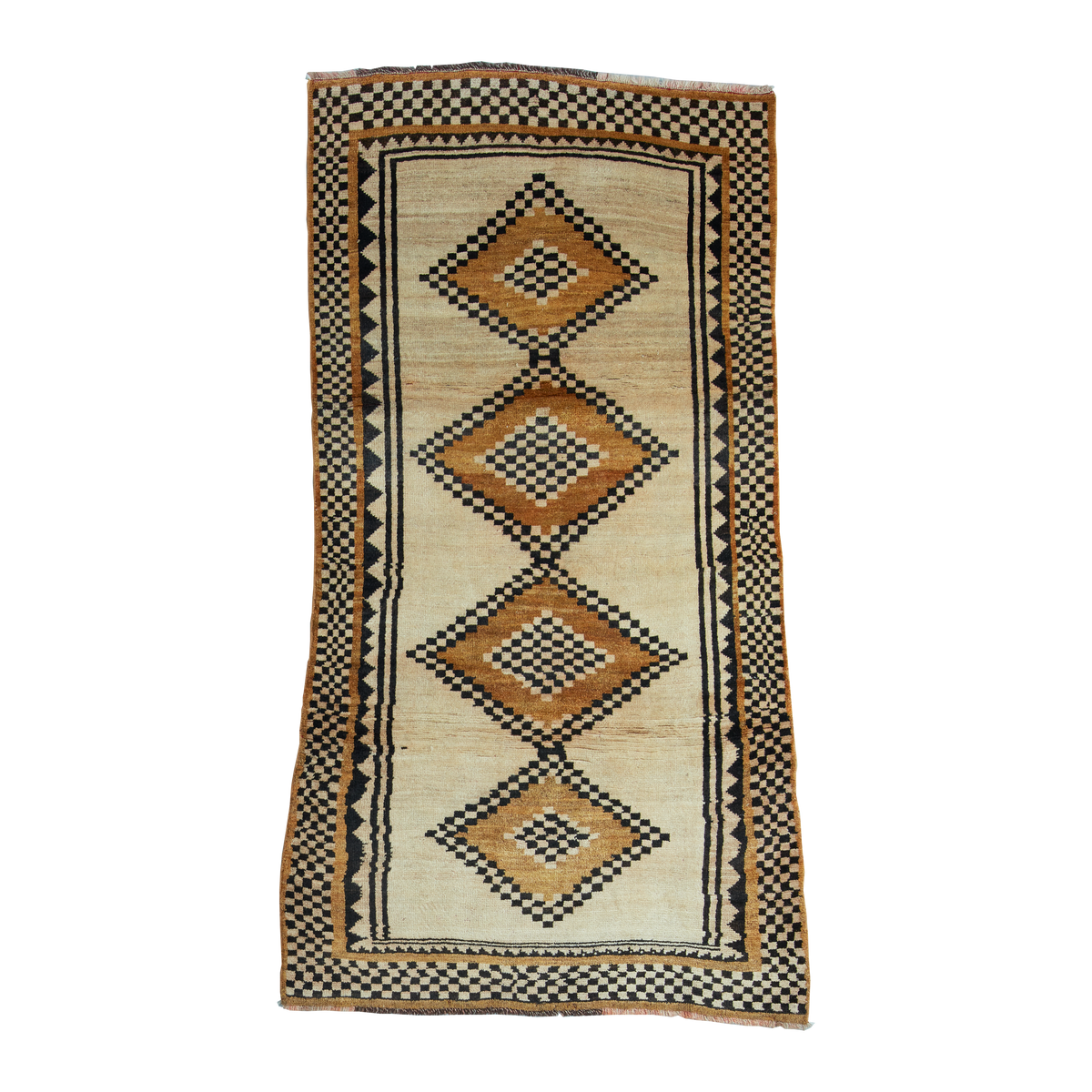 A vintage Southwestern-style wool rug with a cream background, featuring four large vertical diamond motifs in brown, black, and beige, surrounded by a geometric checkered border.