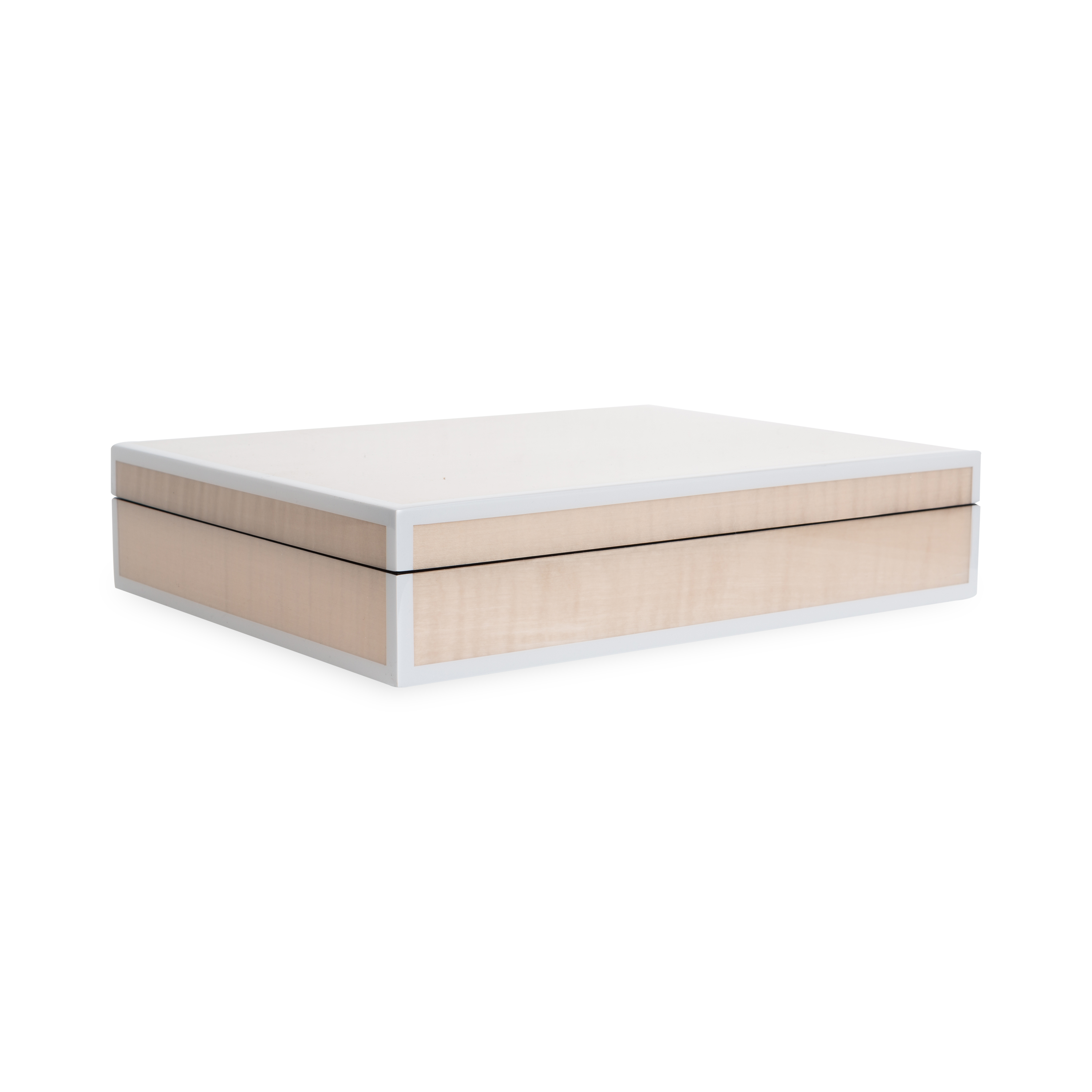 The Lacquered Sycamore Burl Box uses hand-crafted lacquered wood that is produced by the traditional method of hand-pouring multiple layers of lacquer and hand-polishing each layer