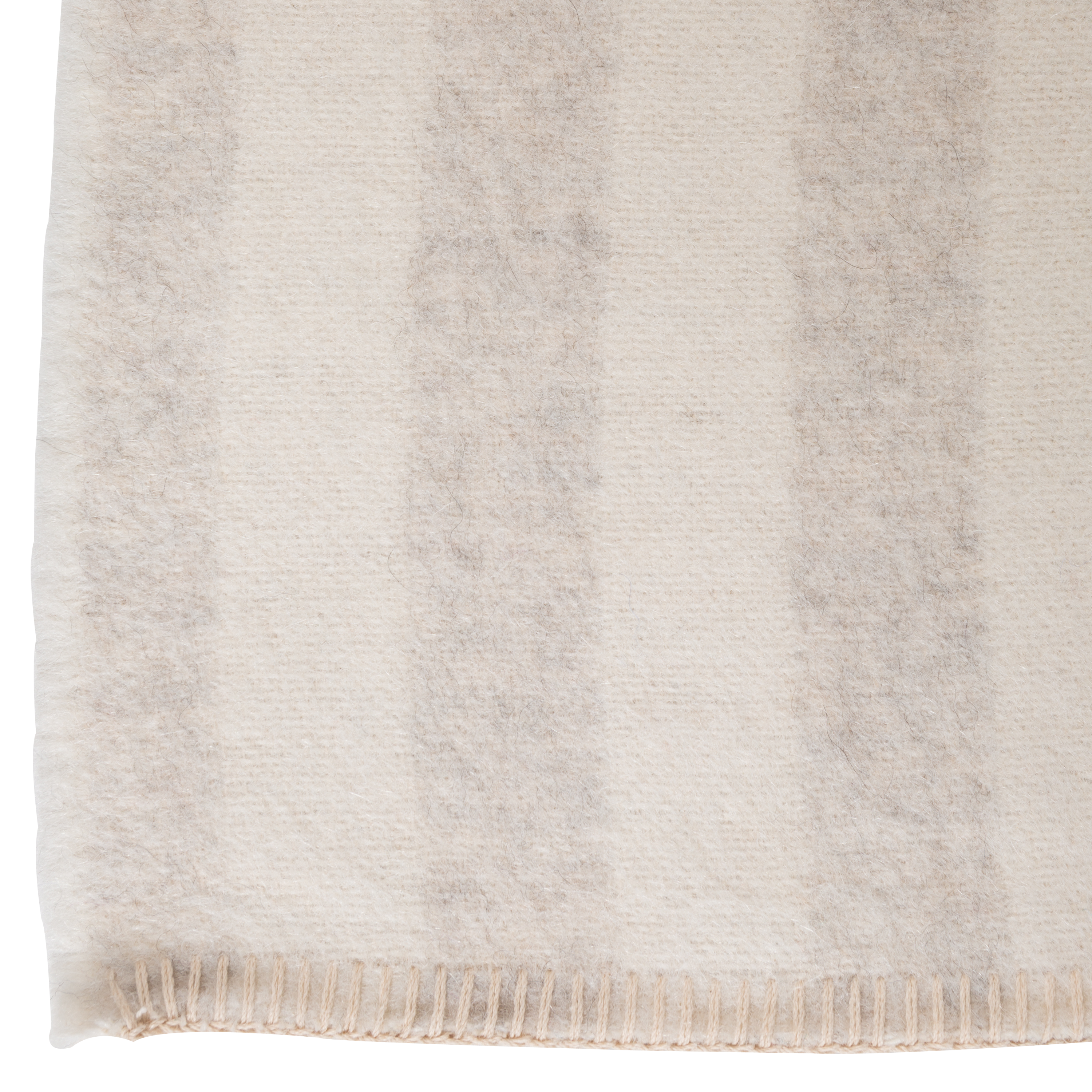 Presenting a luxuriously soft texture, the Stills Stripe Throw is woven with natural superfine alpaca wool and undyed Peruvian cotton.