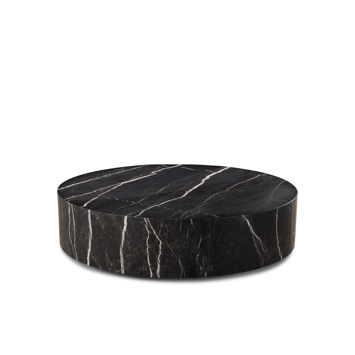 Meta Round Coffee Table in Black Nero Marquina marble from a lower angle, showing the full drum profile and the long diagonal white vein across the top.