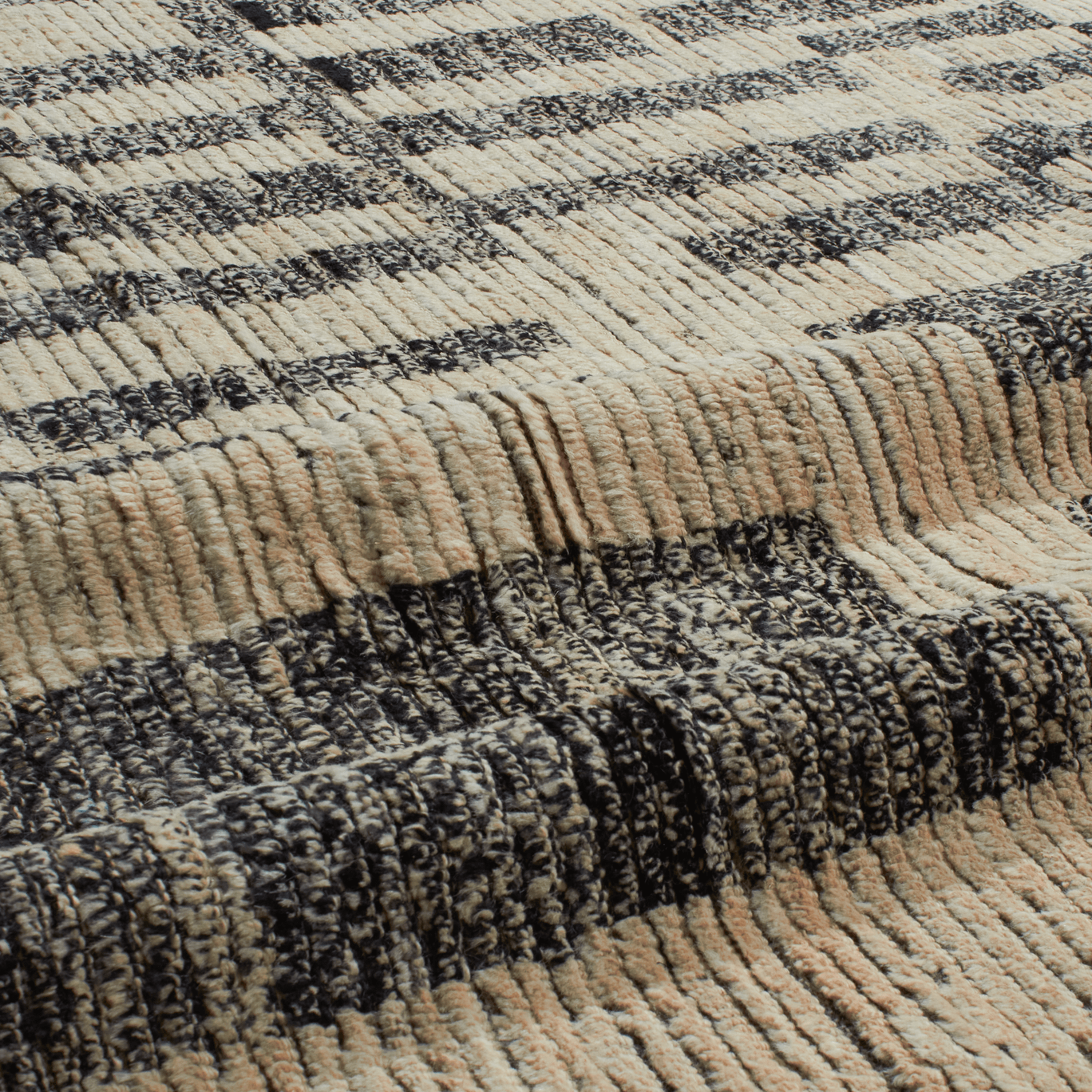 Revered for its lustre and soft hand, the natural qualities of wool from ancient Karakul sheep are honoured through restraint and refinement.