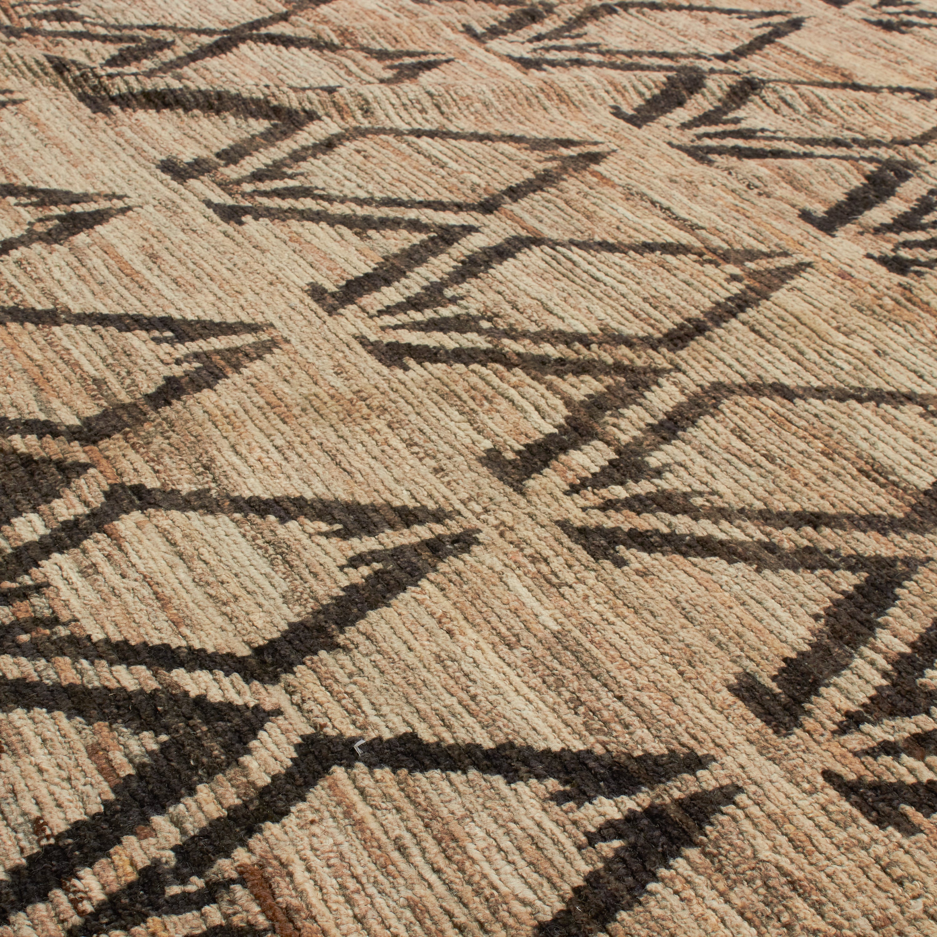 Revered for its lustre and soft hand, the natural qualities of wool from ancient Karakul sheep are honoured through restraint and refinement.