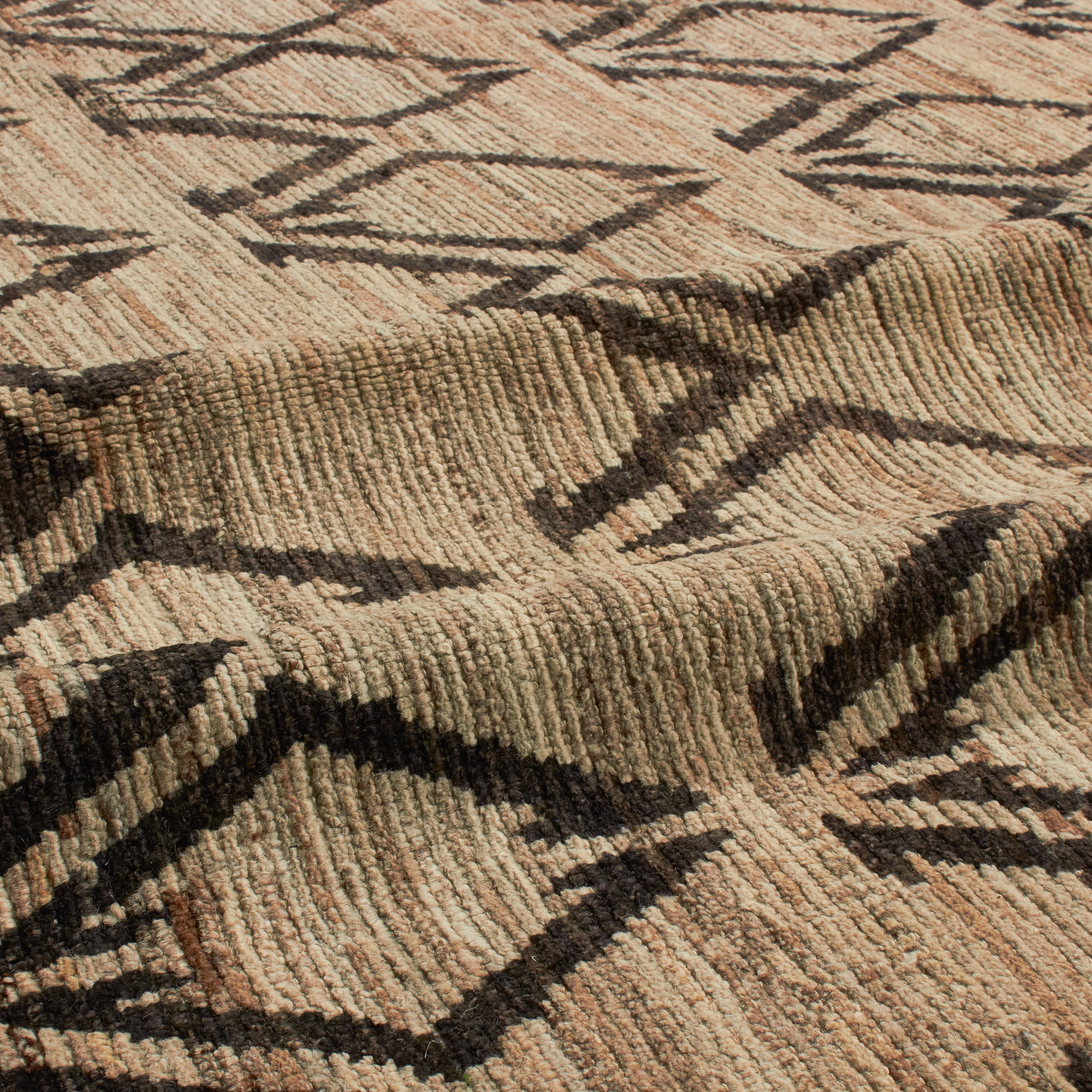 Revered for its lustre and soft hand, the natural qualities of wool from ancient Karakul sheep are honoured through restraint and refinement.