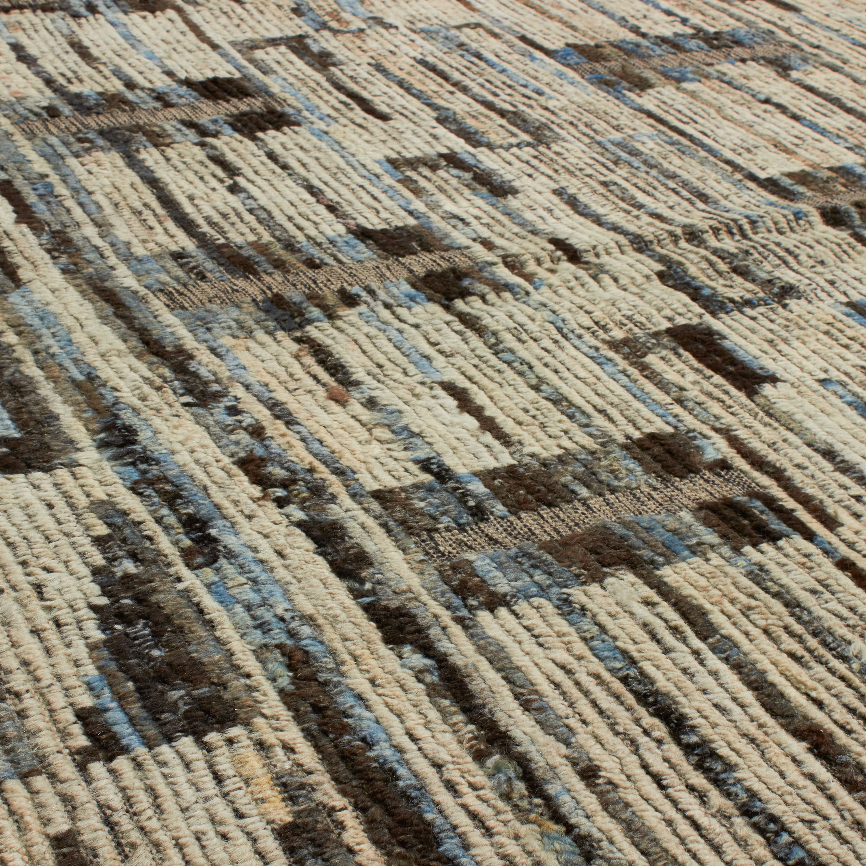 Revered for its lustre and soft hand, the natural qualities of wool from ancient Karakul sheep are honoured through restraint and refinement.
