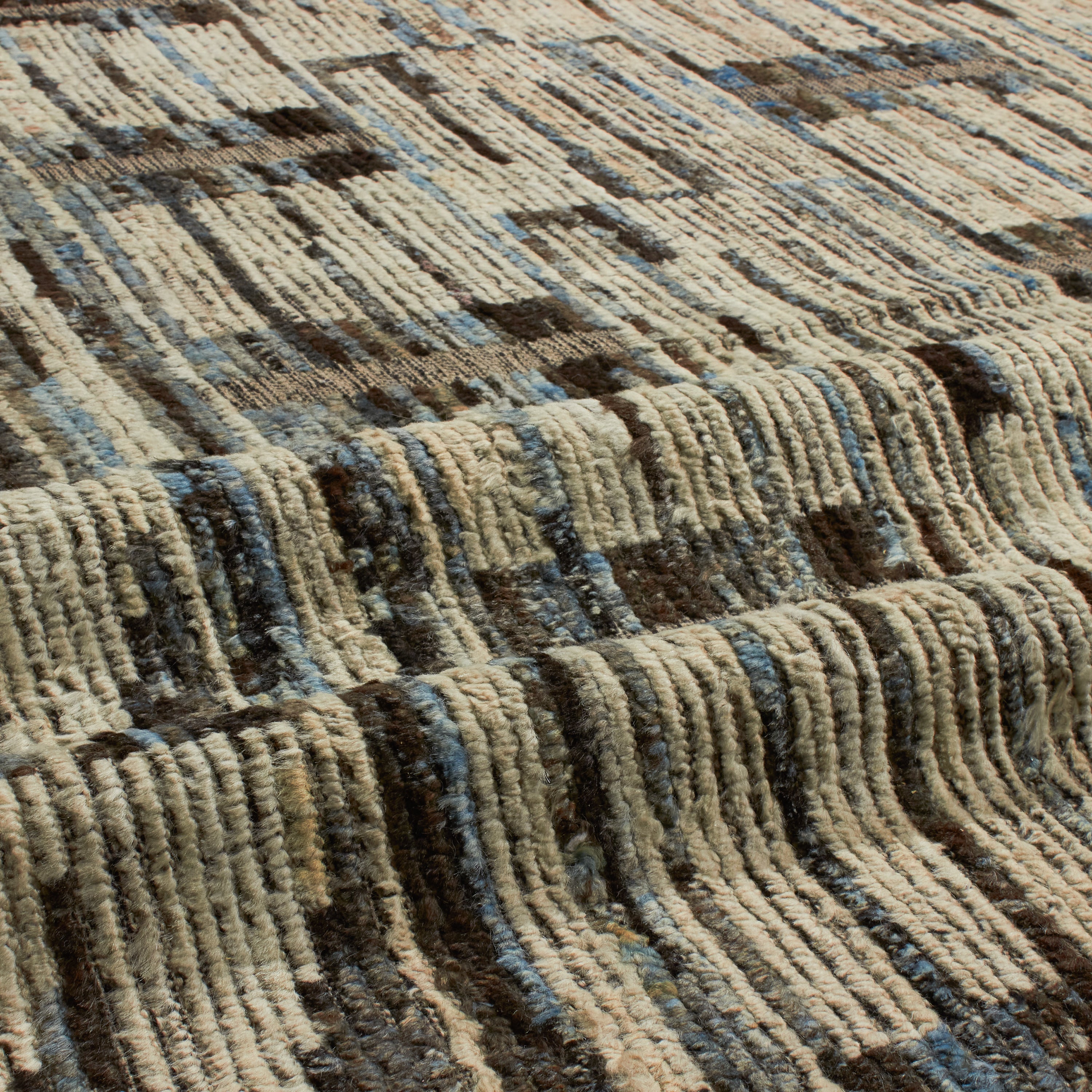 Revered for its lustre and soft hand, the natural qualities of wool from ancient Karakul sheep are honoured through restraint and refinement.