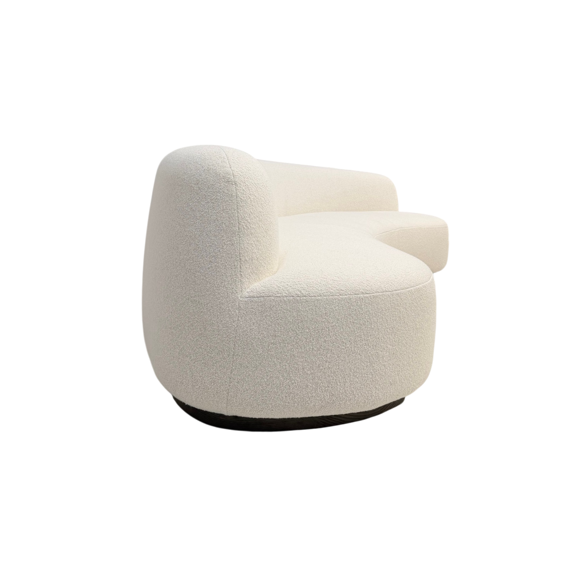 Rhine 120" Sofa in ivory bouclé, opposite angled view highlighting the organic curved profile and wraparound upholstered form.