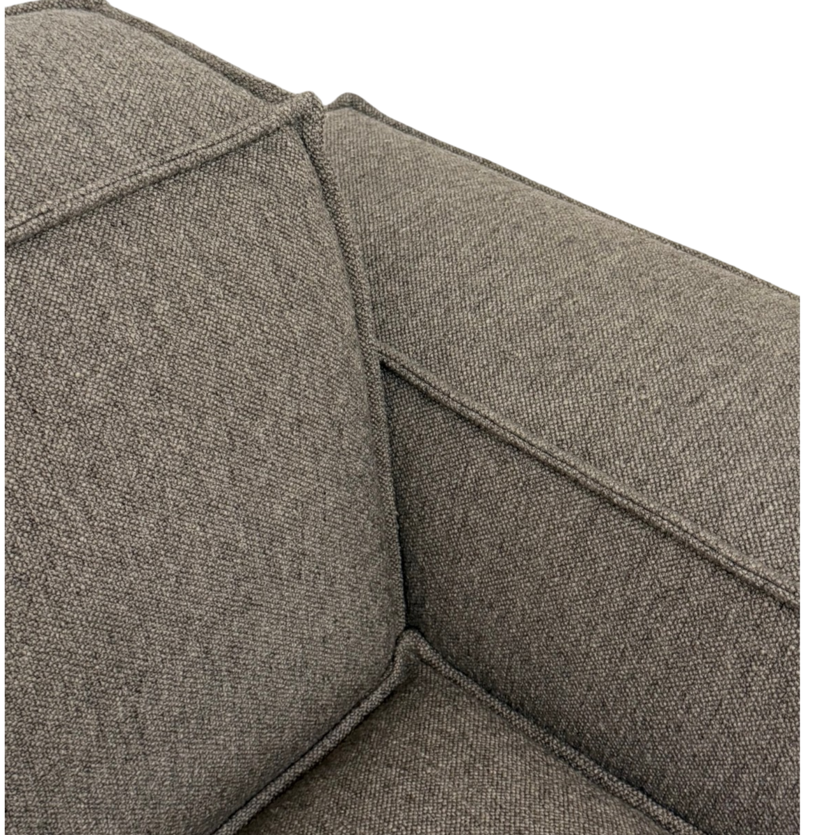 Vetro Modular RAF Chair in a rich heathered brown weave, close-up showing the textured upholstery, piped seams and cushioned construction.