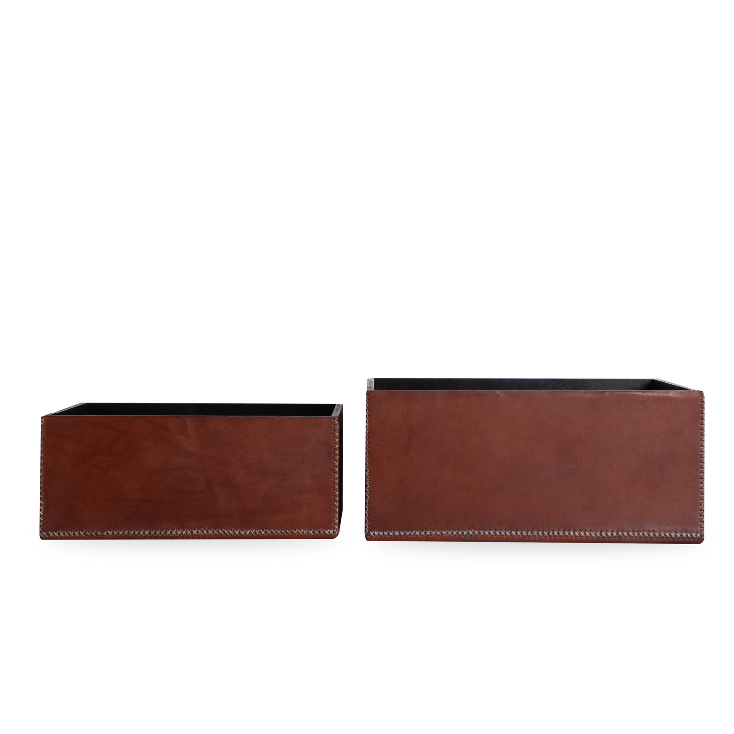 Channeling a connection to local natural materials to form a line of sustainable goods%2C the Solid Leather Box uses premium cow leather from the Paraguayan Chaco region.