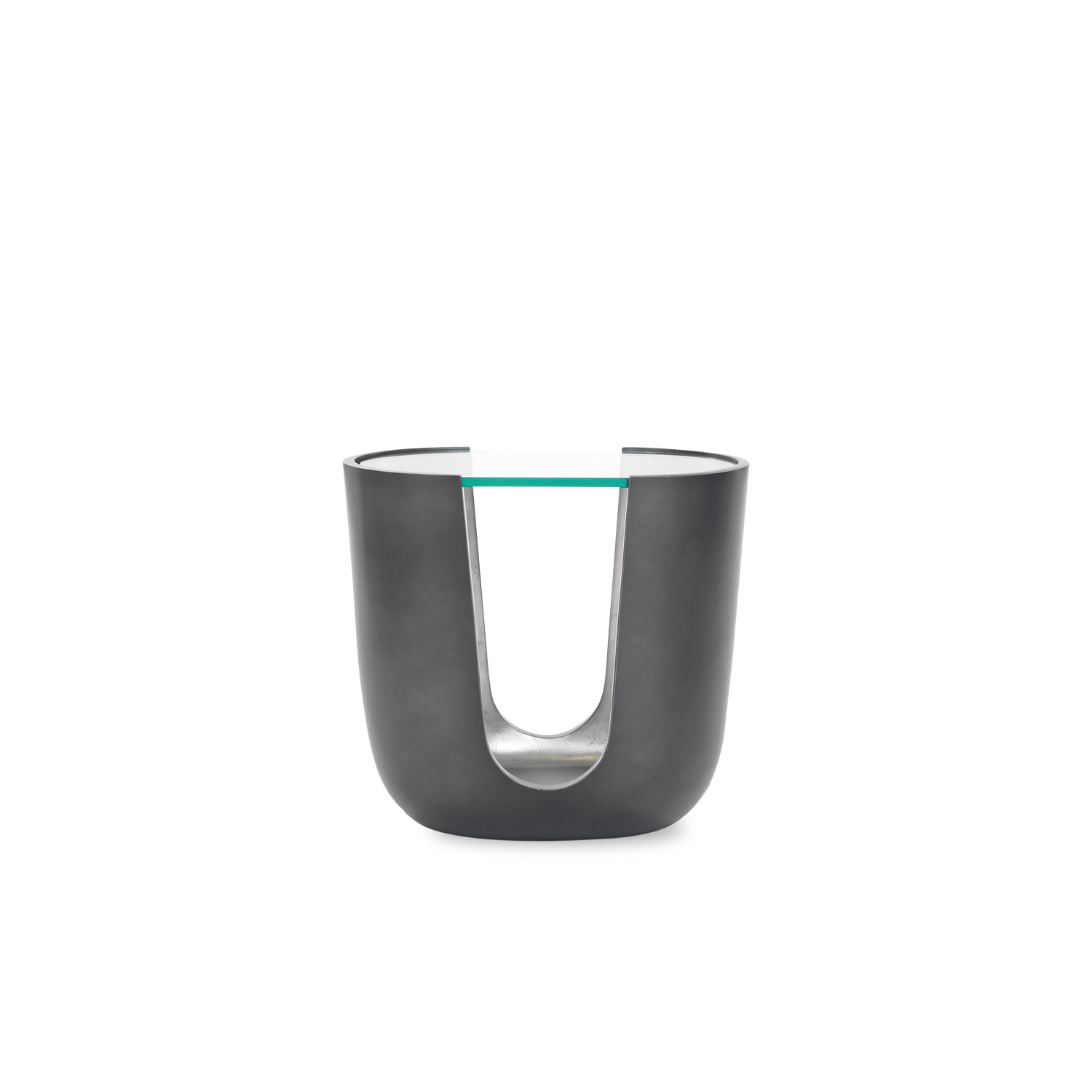With its cut-out base and contrasting metallic interior%2C the Vessel Side Table strikes a luxurious note.