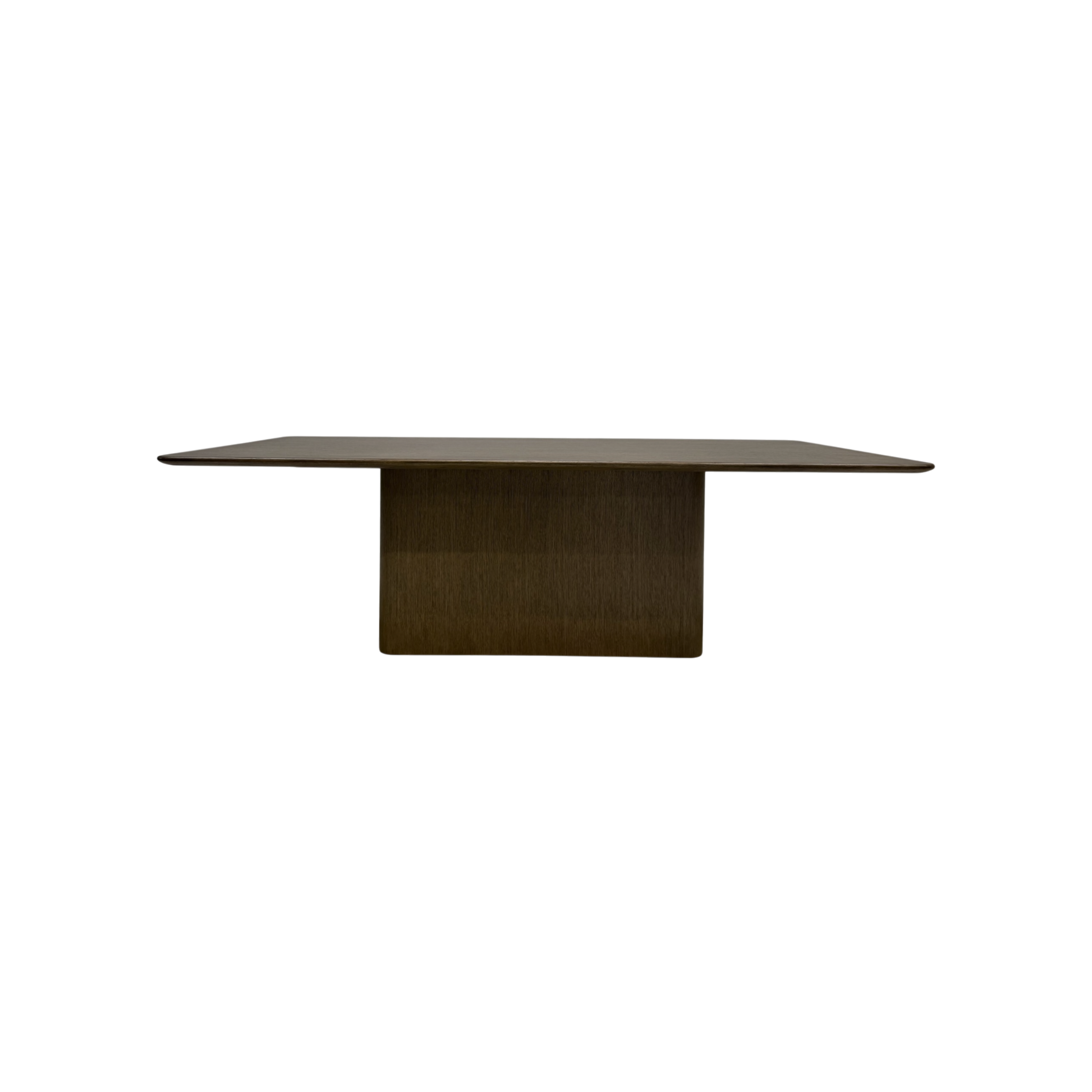Altar 120-inch Dining Table in dark wood with a long rectangular top, softly rounded edges and a substantial central pedestal base.