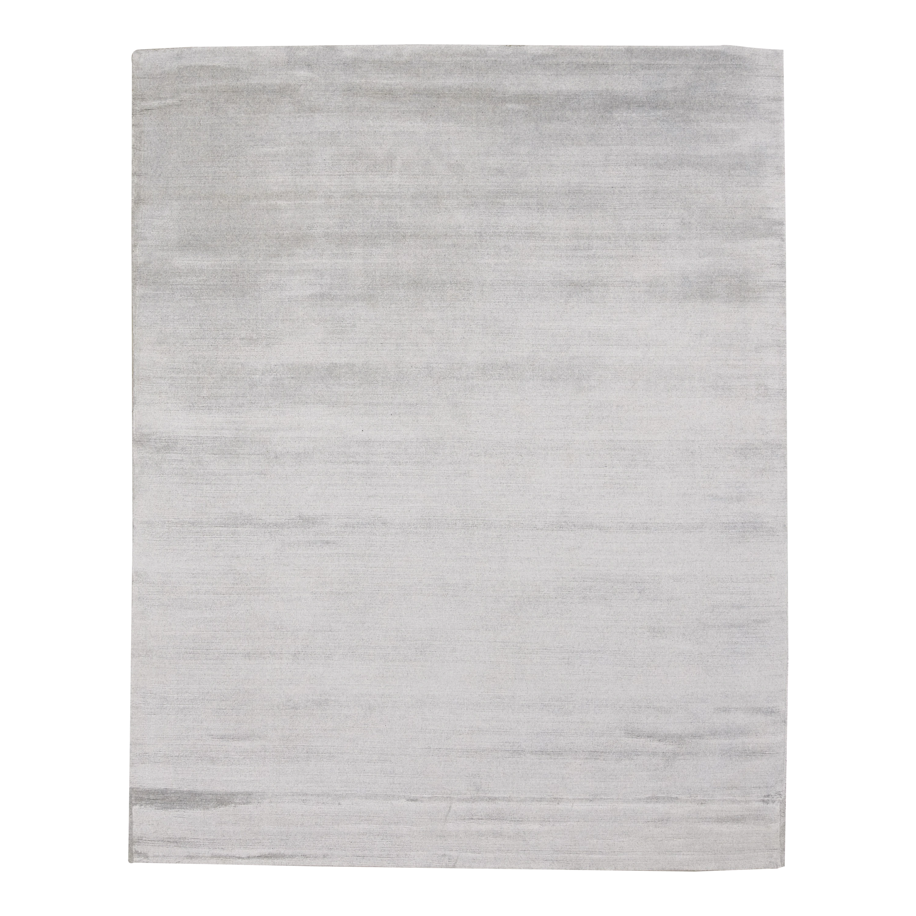 Through intricate weaves, knotting techniques and the use of colour, Elte's Solid and Textured rugs add warmth and depth to a space.
