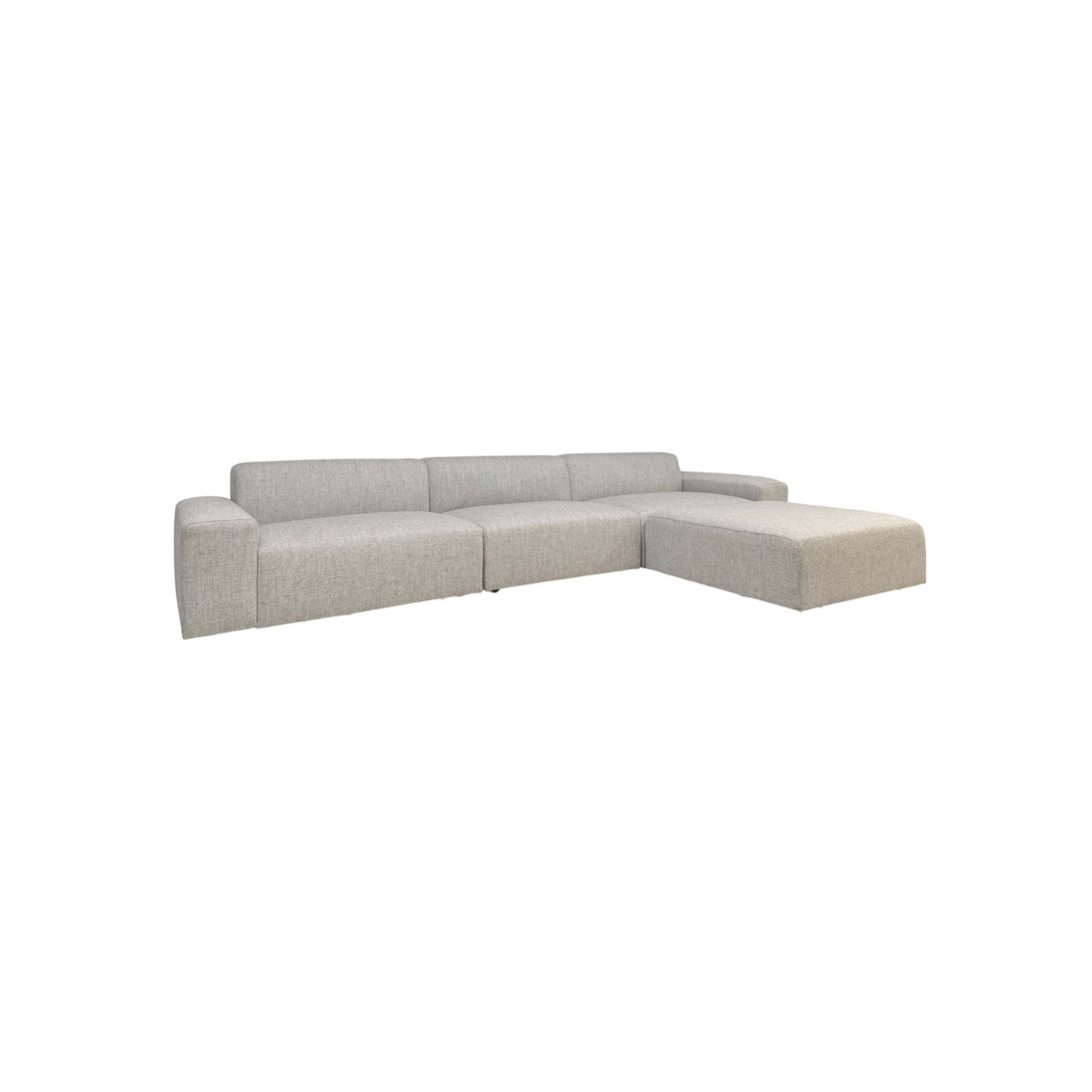 Vetro Bullnose Sectional in light woven grey upholstery, angled front view highlighting the wide seats, squared arms and extended chaise.