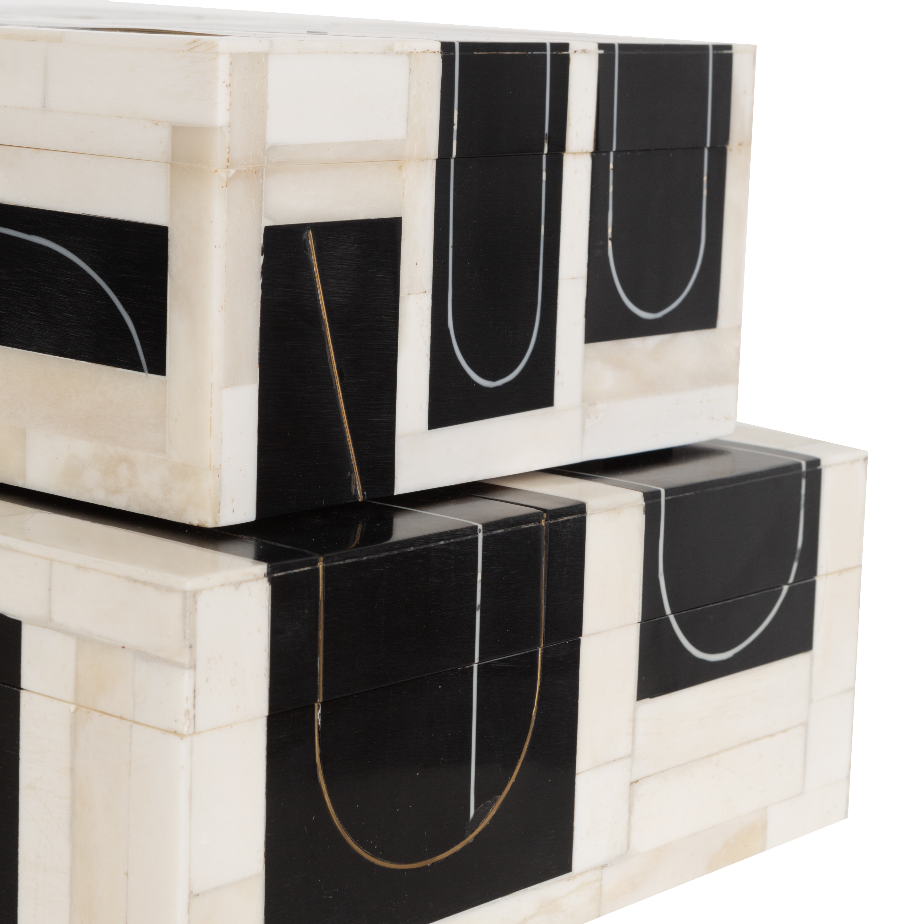 A resin and bone exterior features a brass filet loop that is inlaid.