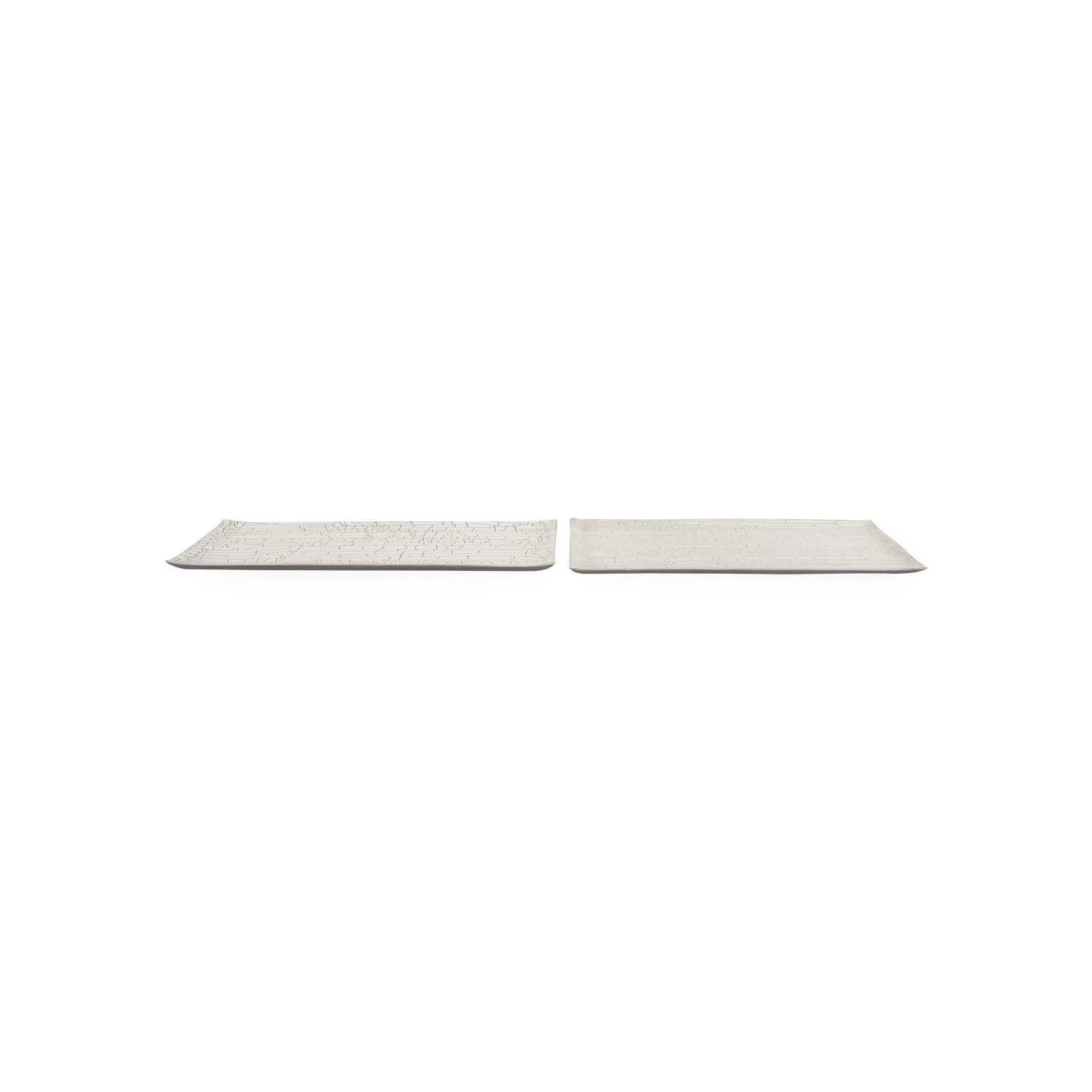 Defined by its intricate white crackle finish%2C the Rectangular Crackle Tray features a low rectangular silhouette and soft%2C rounded corners which allow this piece to effortlessly b