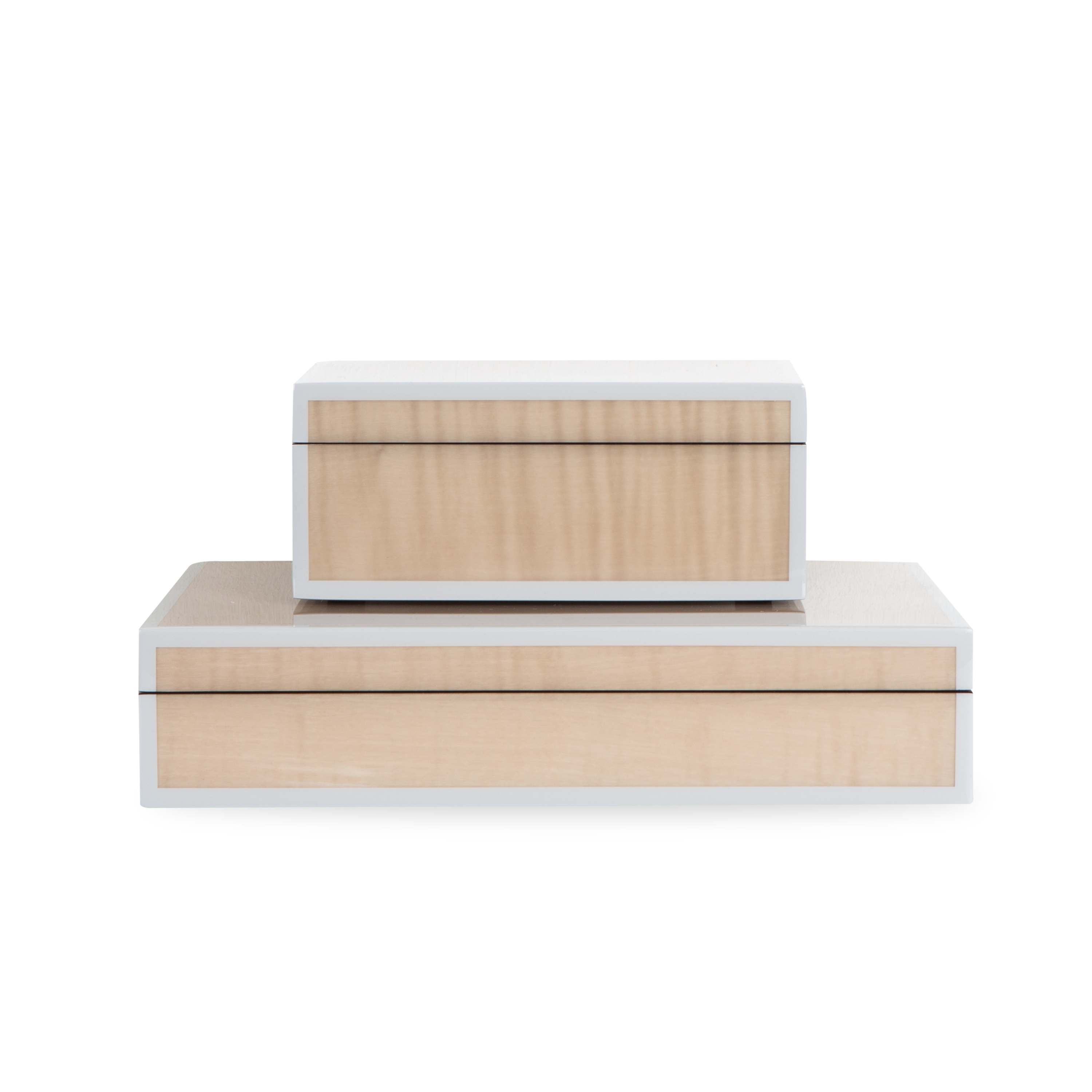 The Lacquered Sycamore Burl Box uses hand-crafted lacquered wood that is produced by the traditional method of hand-pouring multiple layers of lacquer and hand-polishing each layer