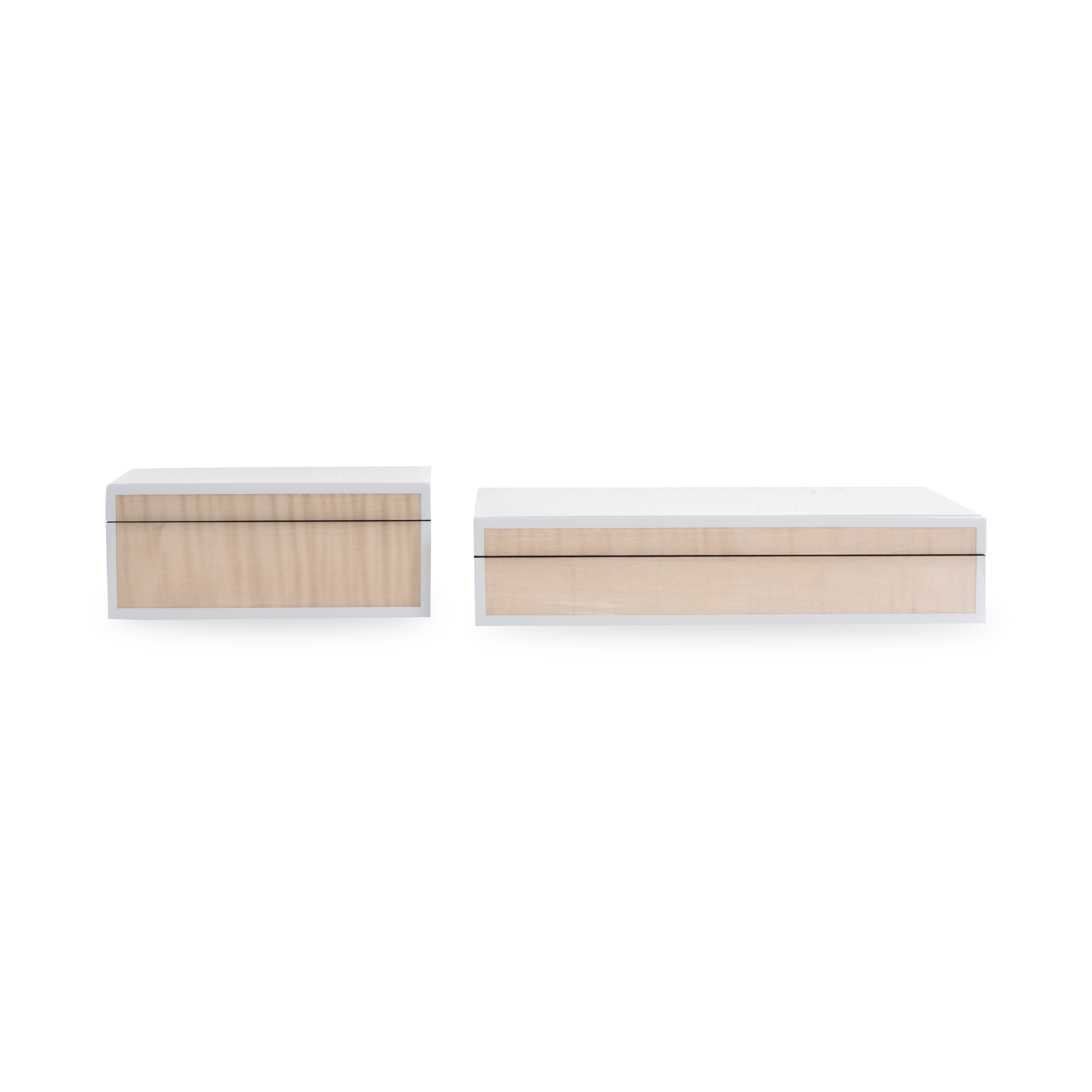 The Lacquered Sycamore Burl Box uses hand-crafted lacquered wood that is produced by the traditional method of hand-pouring multiple layers of lacquer and hand-polishing each layer