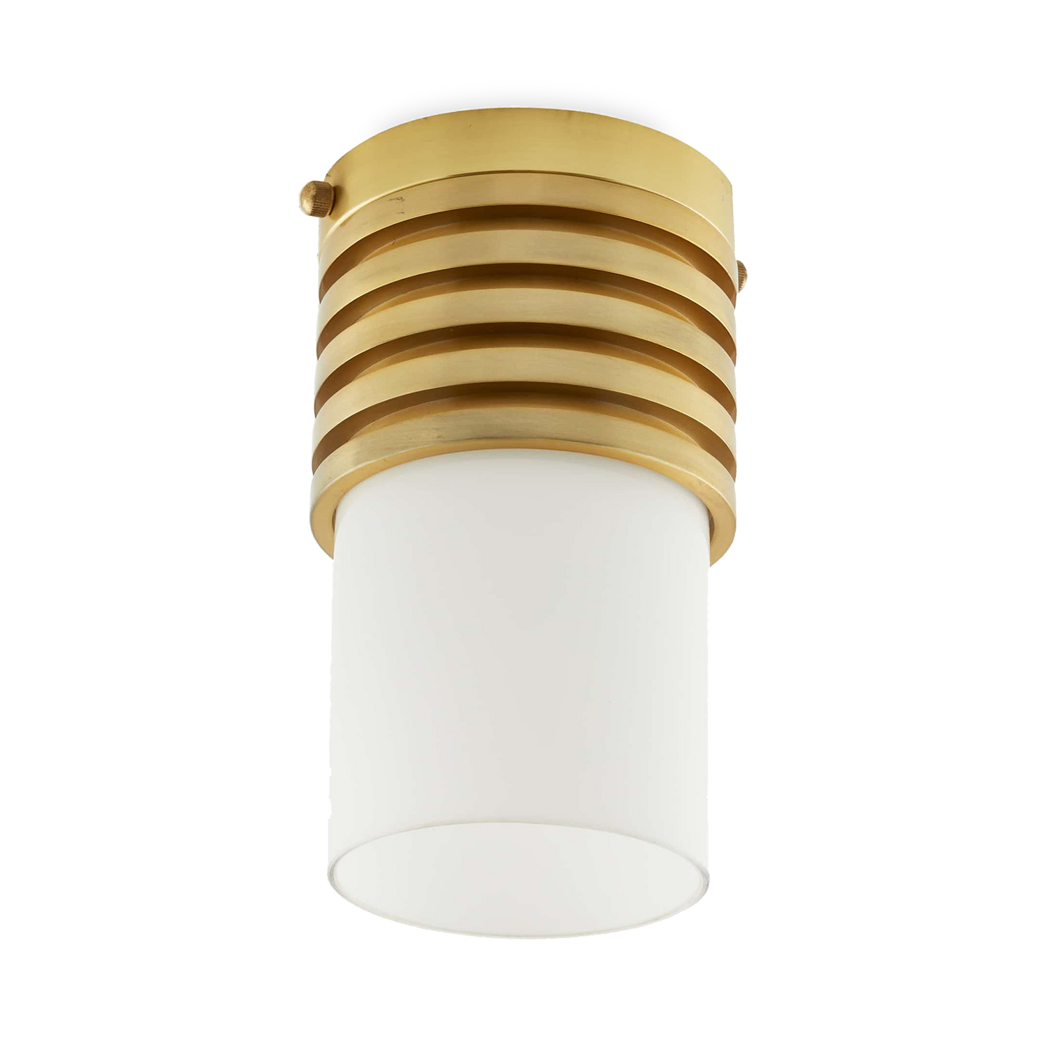 Formed with a machine look%2C as if it was turned on a lathe%2C The Rune Flush Mount is finished in antique brass steel with an opal glass cylinder shade.
