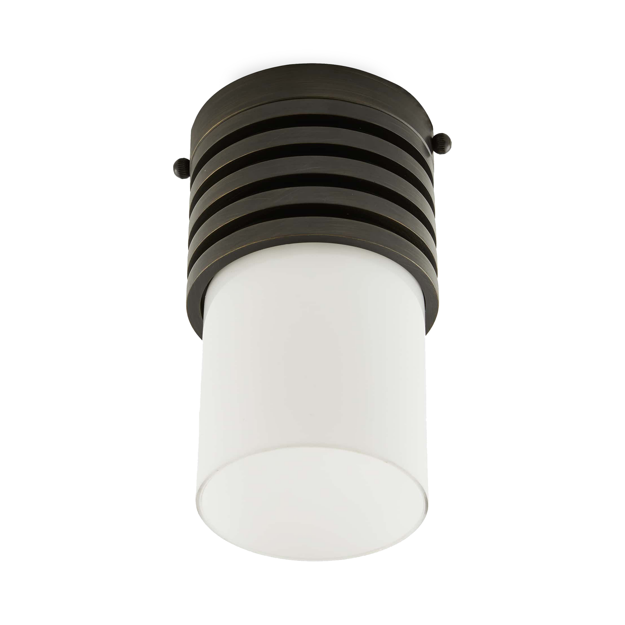 Formed with a machine look, as if it was turned on a lathe, The Rune Flush Mount is finished in antique brass steel with an opal glass cylinder shade.