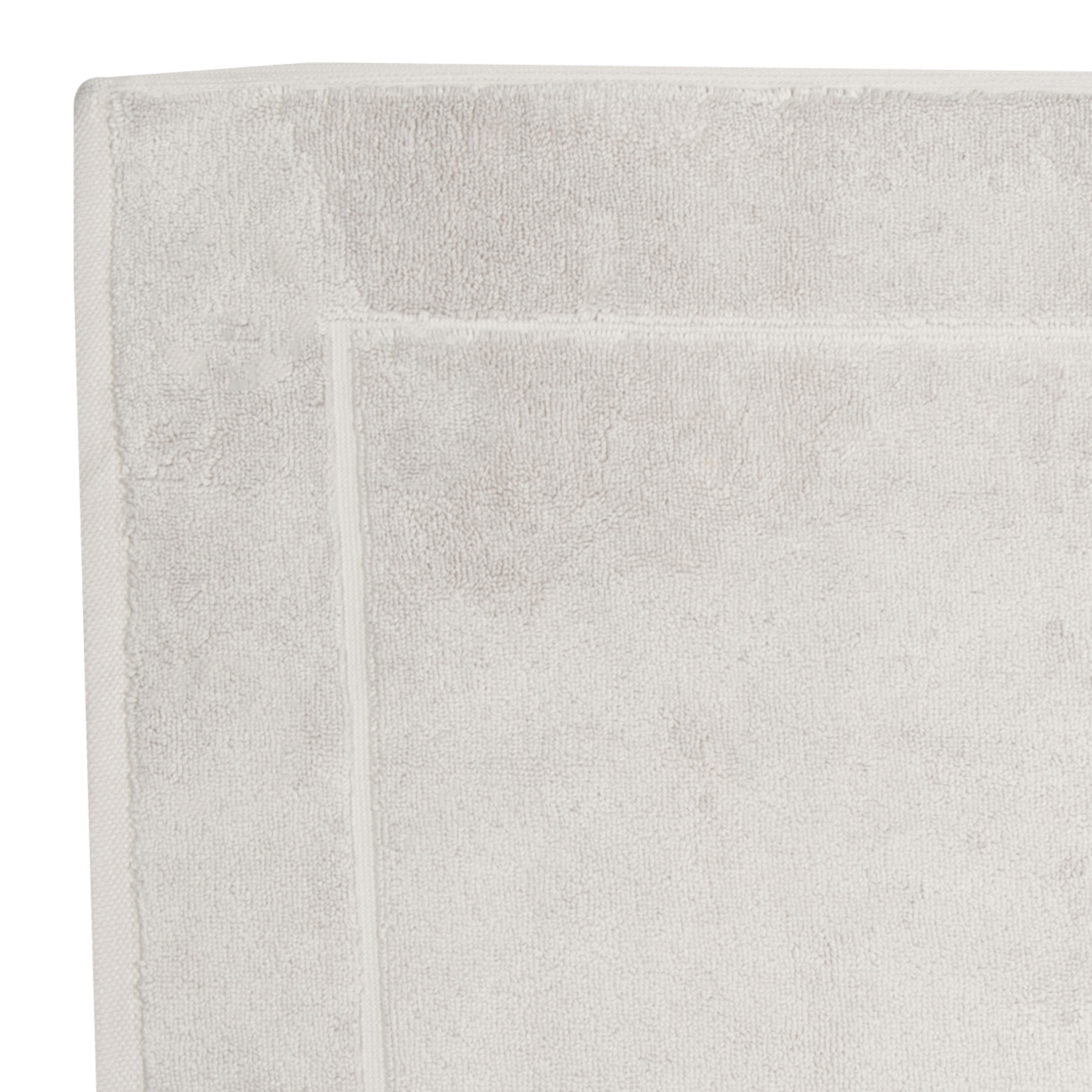 The Sarma Tab Mat uses a dreamy color palette that is woven with simple finished hems for a clean, modern look.