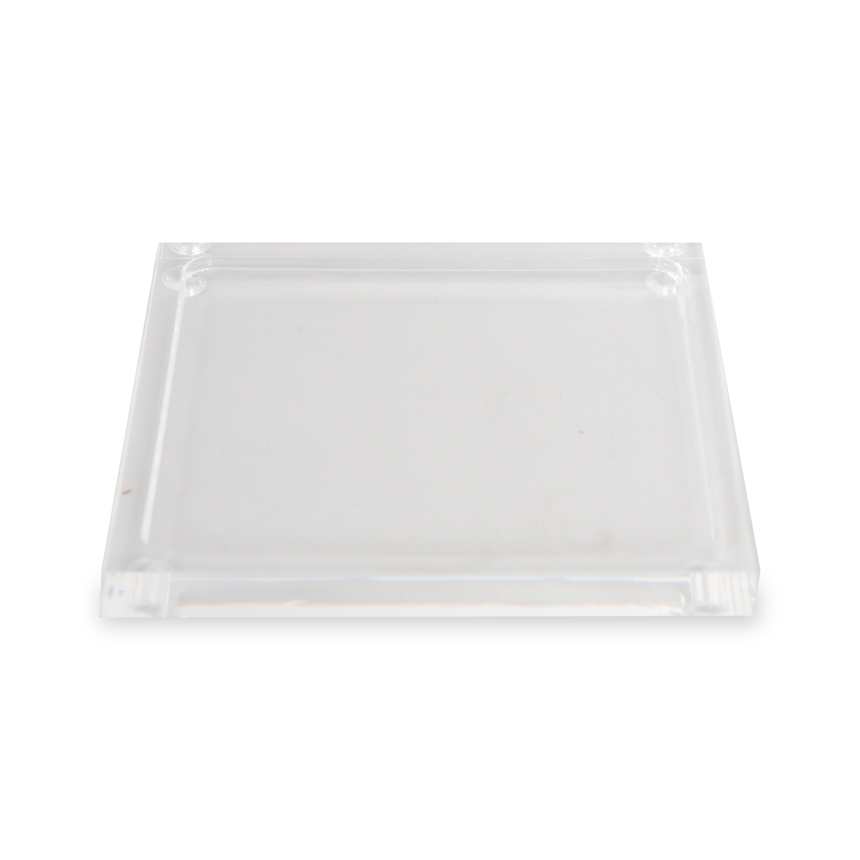 These acrylic coasters in a clear finish offer a sleek way to protect your tabletops and keep your drinks in place.