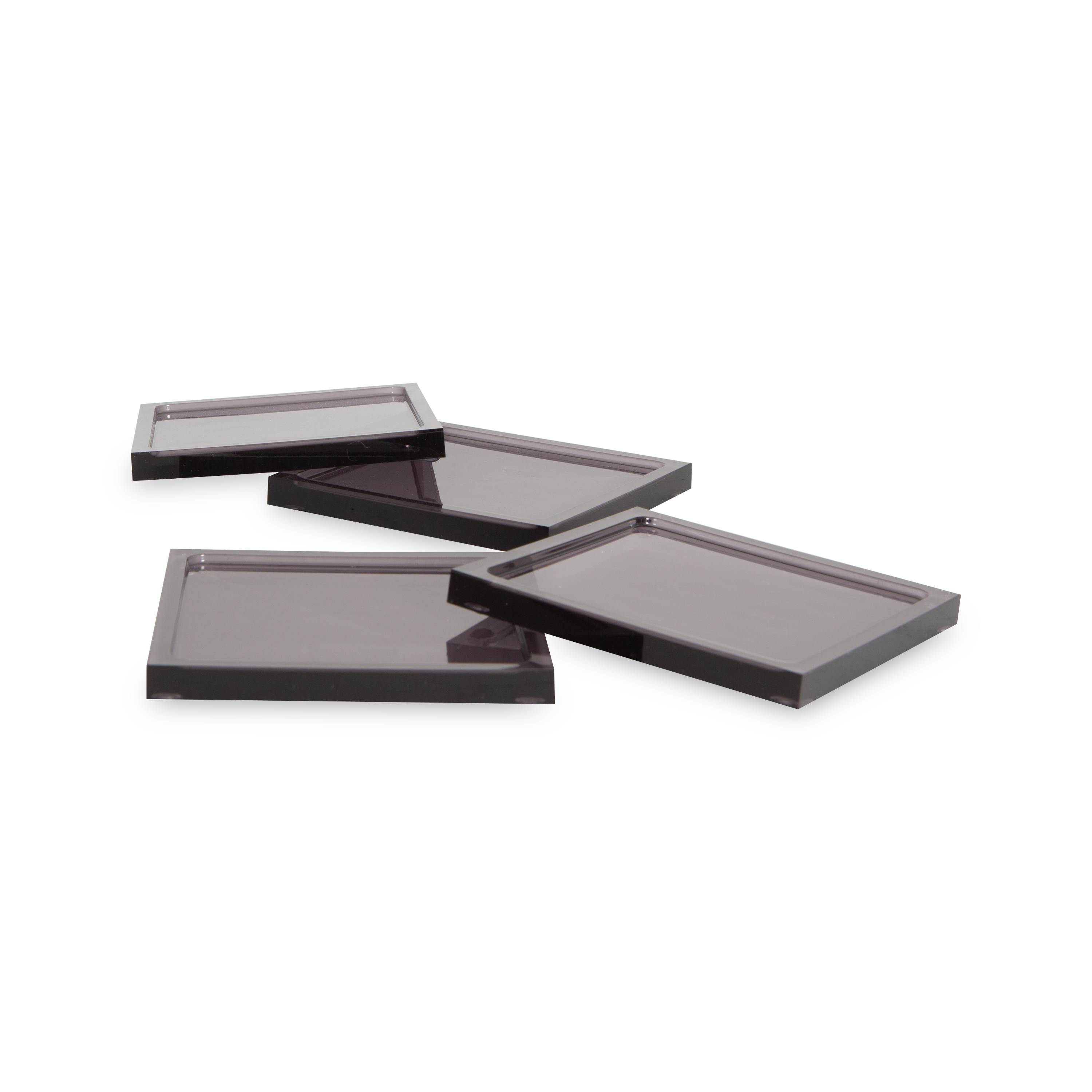 These acrylic coasters in a black finish offer a sleek way to protect your tabletops and keep your drinks in place.