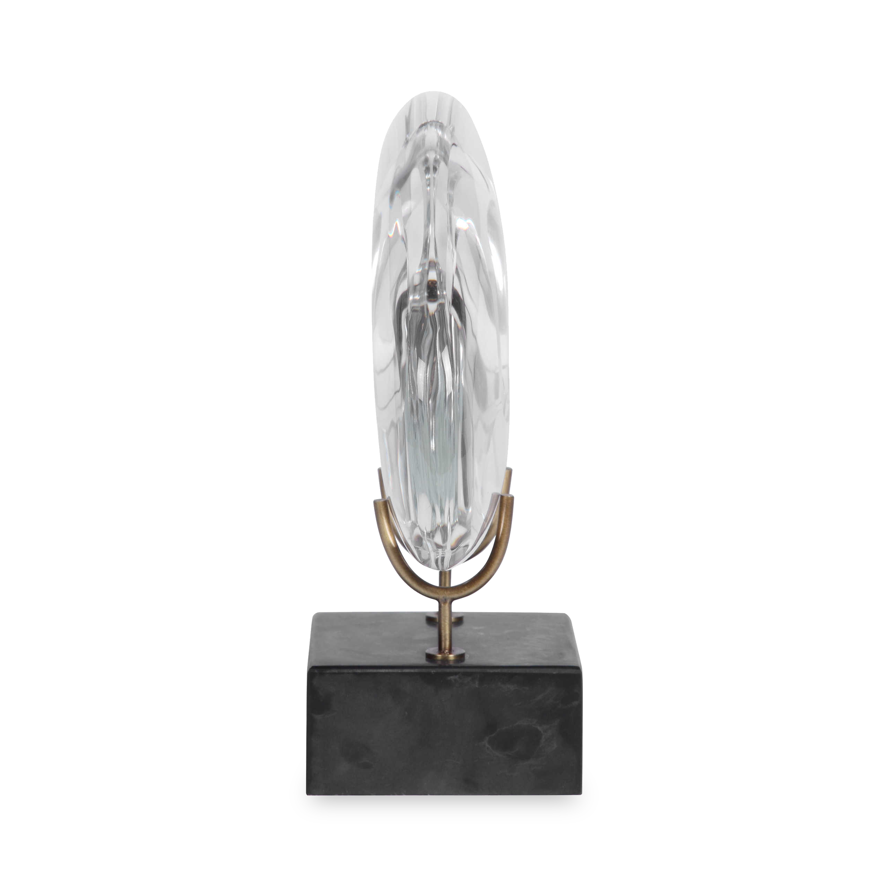 The monolithium shape is executed in crystal with a honed black marble base and brass pegs.