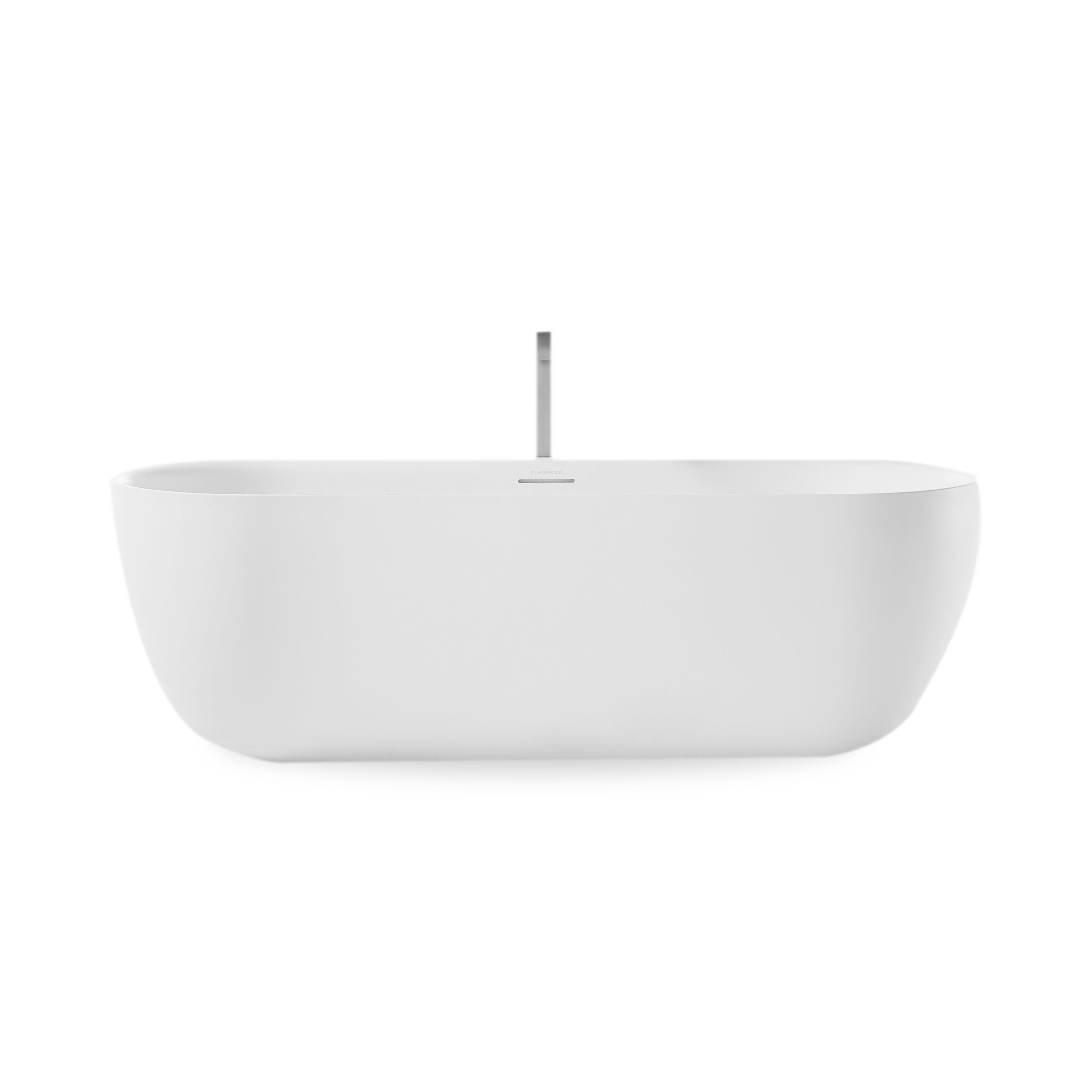 Freestanding soaker bath with tapered rim and integrated linear overflow.
