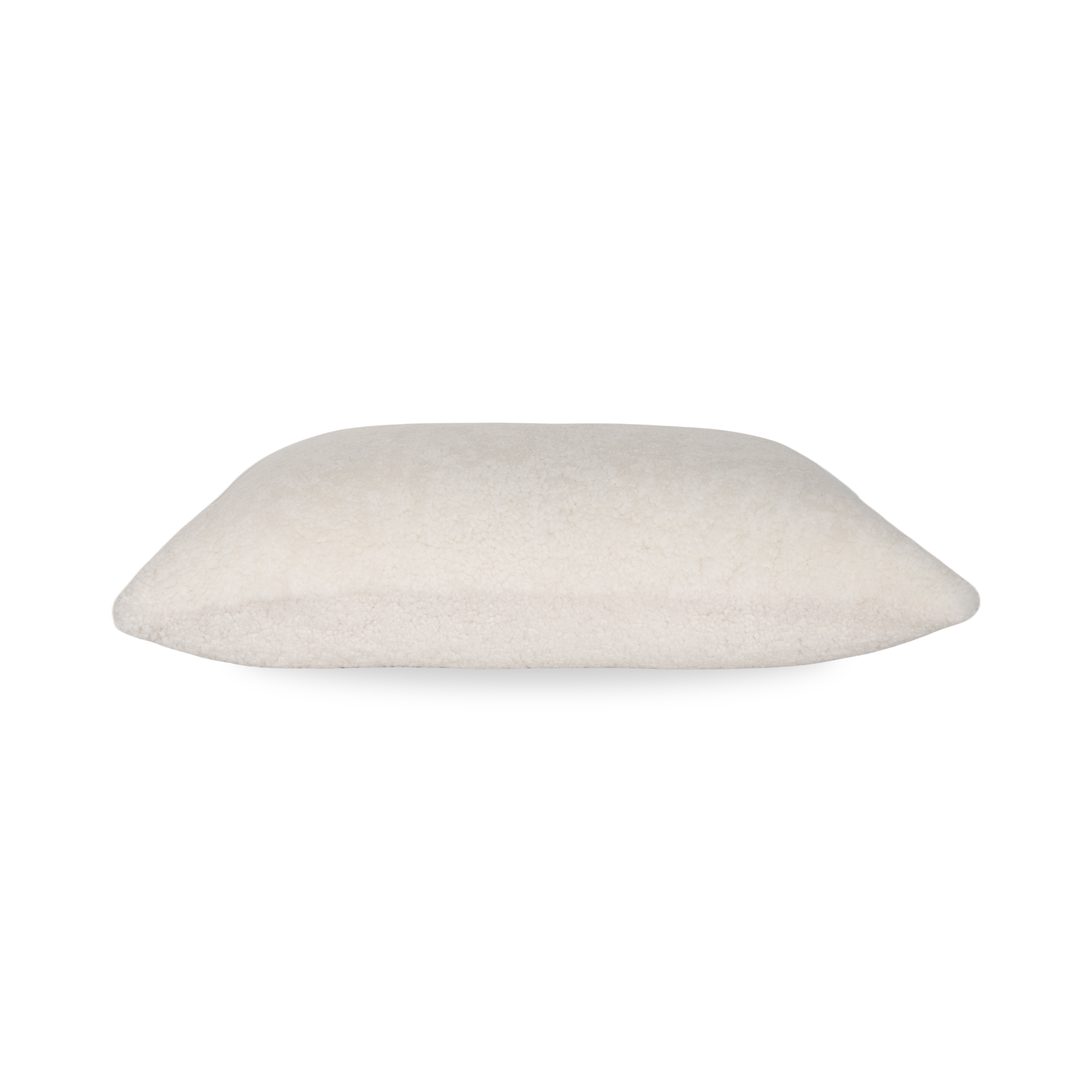 With a welcoming, soft exterior, the Sheepskin Pillow features a neutral beige tone on real sheepskin from Denmark.