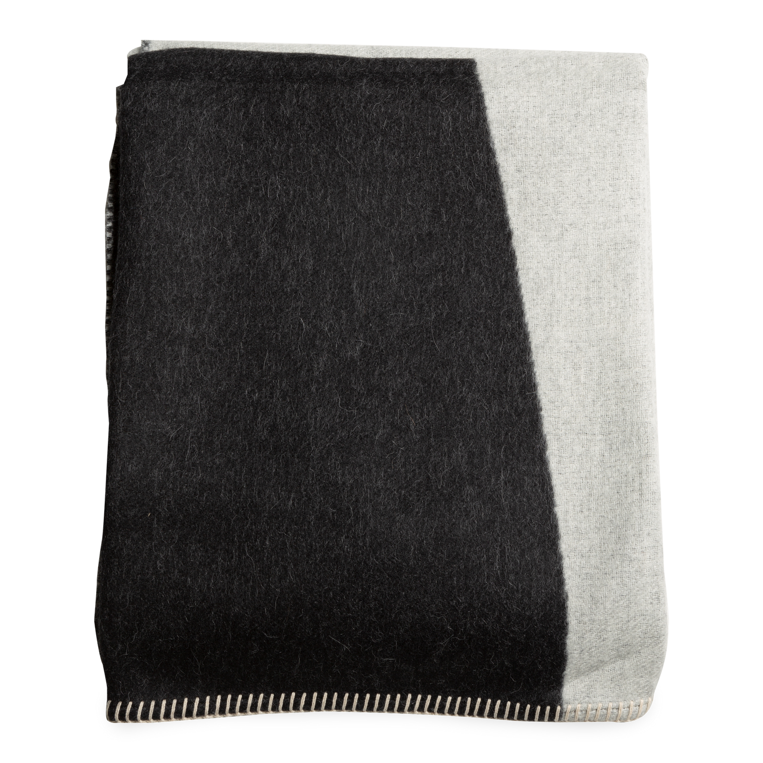 The Yin Throw in 100%25 baby Alpaca%2C is reversible and lays the foundation for an unquestionably ethereal space.