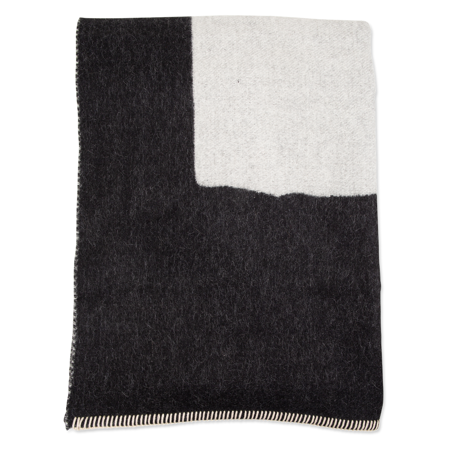 Timeless and simple%2C the reversible Generation Alpaca Throw is made in Canada.
